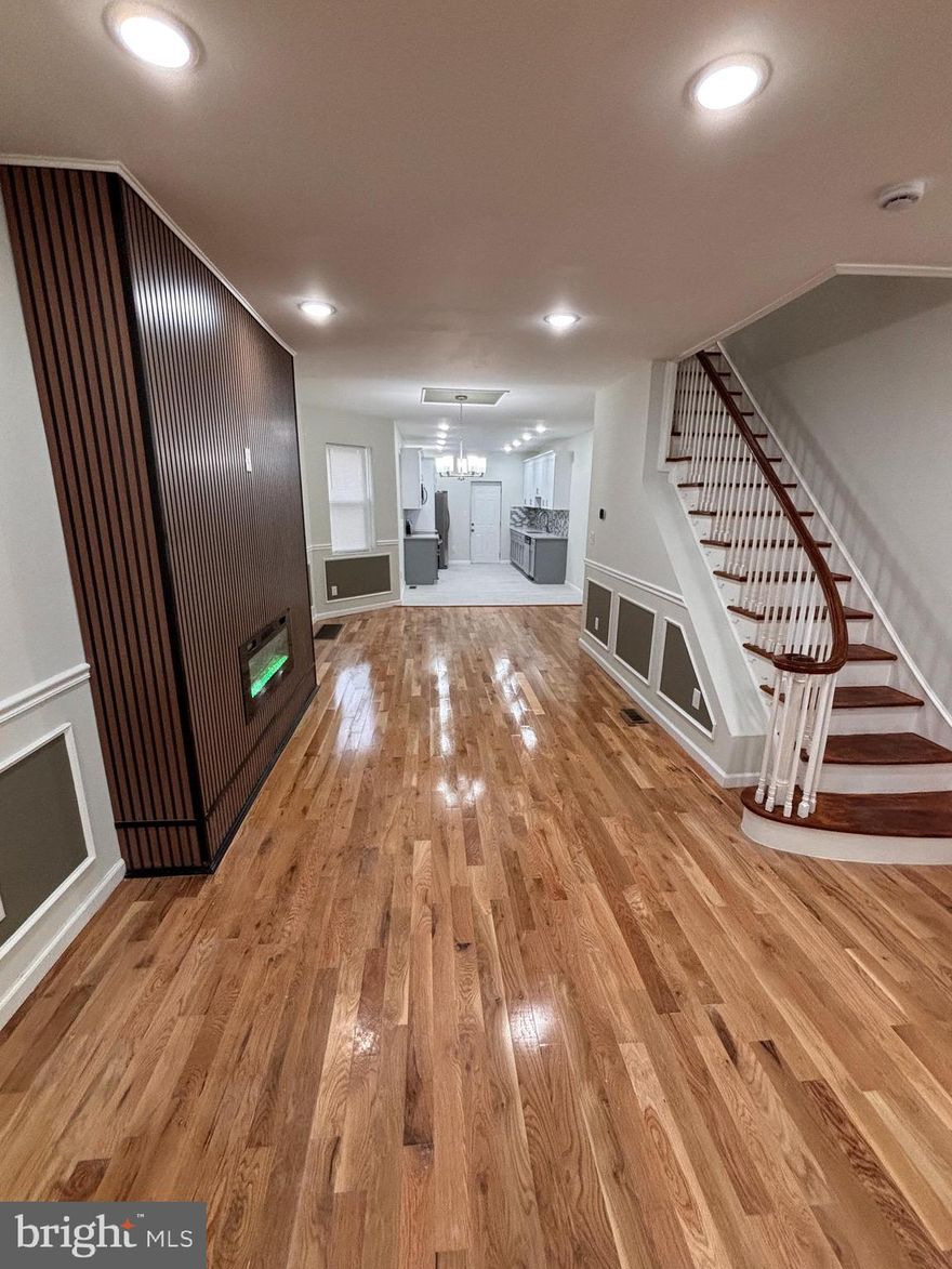 Stunning and fully permitted 4 bedroom and 2.5-bathroom home is now available for sale.  Welcome to your dream home in the heart of Overbrook. Upon arrival, you'll notice a well-kept block, The newly rehabbed residence which offers 4 bedrooms and 2.5 bathrooms, providing ample space for comfortable family living.  As you enter, are welcomed by a formal foyer with closet for all you and your guests. Then, step into the living room with open layout flowing seemingly from living room into the dining room with fireplace and then into a modern state of the art kitchen featuring quartz counter tops and stainless-steel appliances with modern backsplash, with the door leading to a private backyard.  Next, 4 bedrooms, 2 full bathrooms upstairs. A master bedroom with its an ensuite bathroom.  3 more bedrooms and Hallway bathroom with European tile.  finally, a half bathroom and finished basement perfect for entertaining friends and family. Could it get any better though? It does! This home also has a new HVAC system, plumbing, Electrical and new roof with warranty. This house is conveniently located from shopping dinning parks and schools. This home combines contemporary elegance and comfort making it a must-see property. Don't miss the chance to make this stunning house your new home.