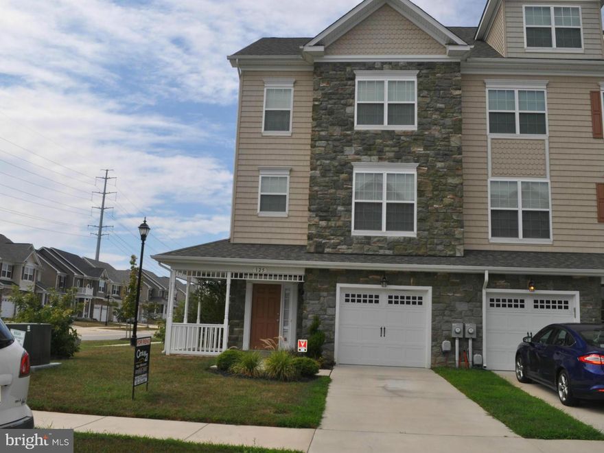 Large 3 level townhouse offers 2600+ sq ft , 9" ceilings, 9 ft  bump out on 2 first floors, 3 bedrooms, 2 full baths, 2 half baths, stainless steal appliances, gas stove,  granite counter tops & 42" cabinets makes for a beautiful kitchen, 10X20 sunroom, nice large deck, finished basement, end unit w/ garage and security system included.   Beautiful come see for yourself.