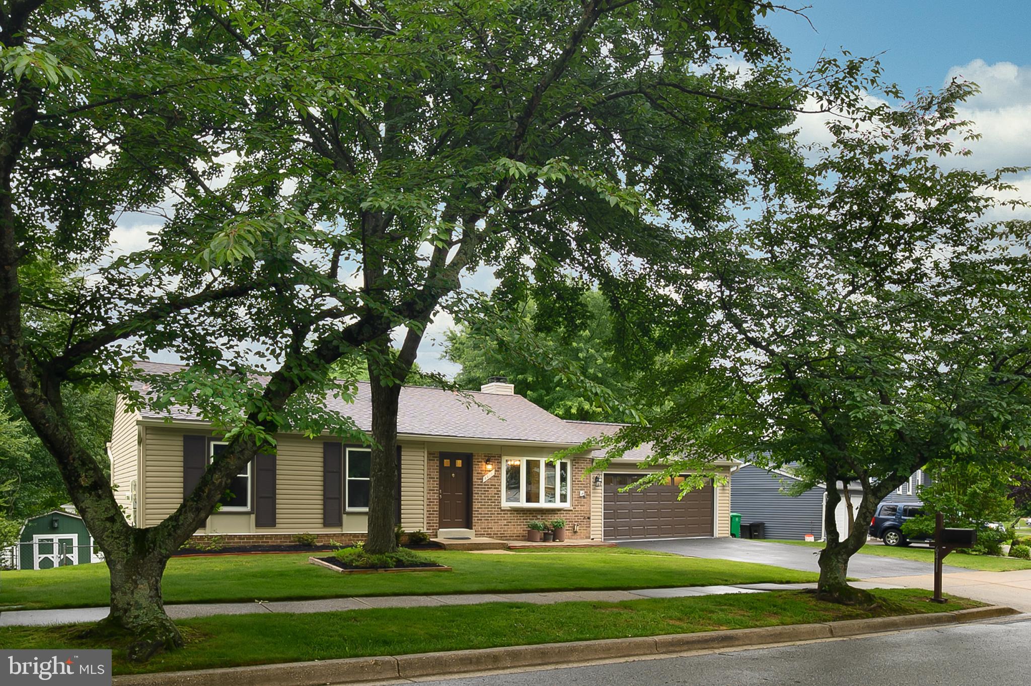 Fabulous home featuring fresh paint and carpet; new front door and windows in 2024; updated eat-in kitchen with granite and backsplash; hardwood floors in living and dining rooms with door leading to large deck; bathrooms updated in 2019; 3 bedrooms upstairs with office in lower level making great 4th bedroom (no closet); brick wood burning fireplace in lower level family room; walkout new slider to brick patio and fenced backyard. Home includes a whole house water filter; sump pump, large utility/storage room; 2 car garage. Solar panels are 100% owned (no existing lease),