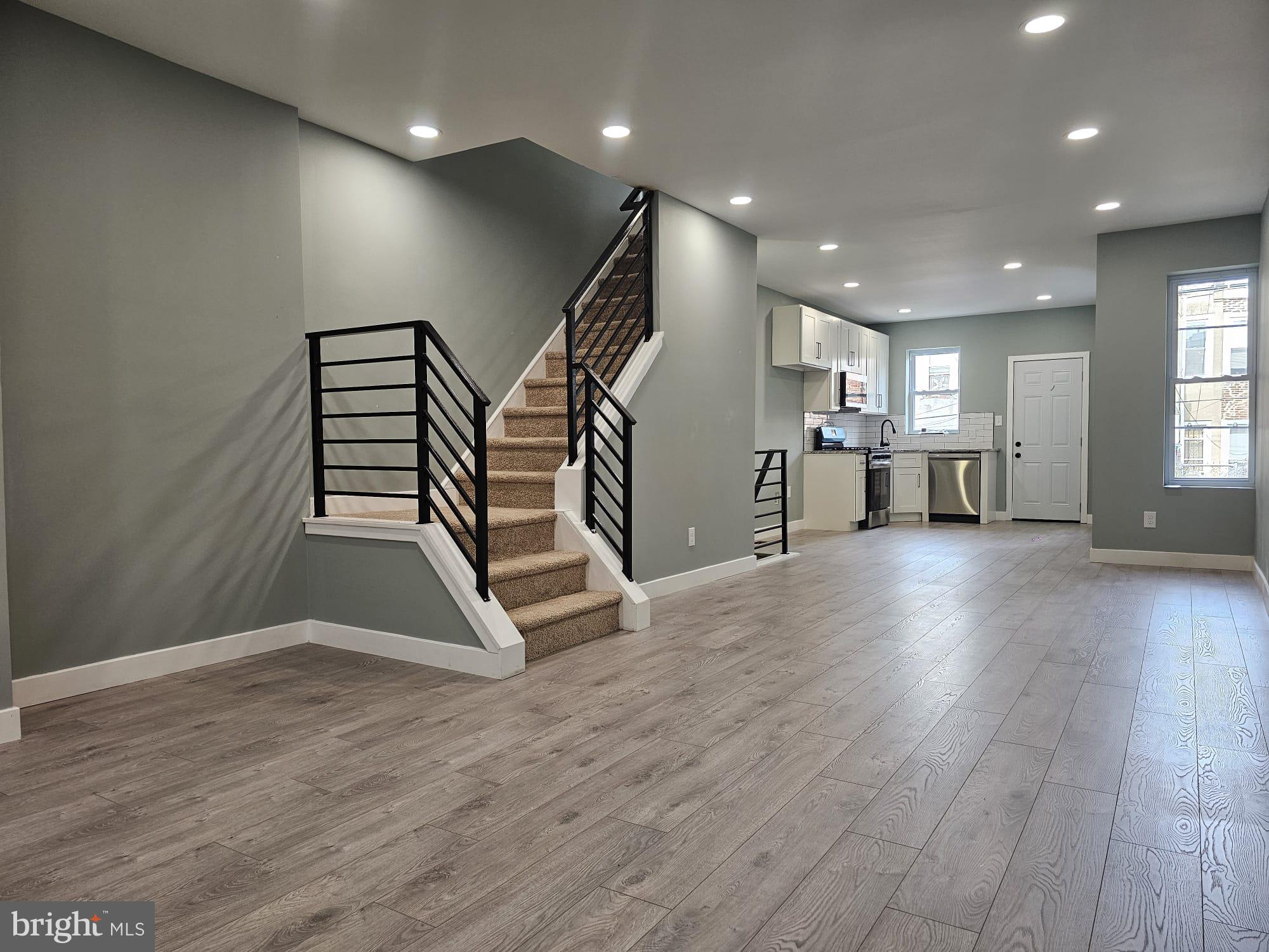 Back on market, buyers mortgage fell through - Entirely rehabbed 3 bed 2 full bath row home in Logan! Situated on a quiet block- this is a an absolutely excellent location! The builder left no stone unturned. The home is draped in the most modern and elegant finishes at every turn. Luxury flooring, granite tops, high end shaker style cabinets with black accents peppered throughout the home gives the home the modern rustic yet luxurious touch.All new mechanical systems including High Efficiency HVAC systems (central air and heat) all new electrical and plumbing throughout the home. The finished basement space is the entire footprint of the home and is more than enough room for gamerooms, or extra bedrooms etc. This will certainly not last - schedule your showings today!