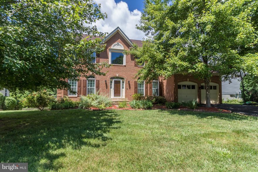 Beautiful Brick Colonial on cul-de-sac street! 6 Legal bedrooms! Large open two story foyer, spacious kitchen w/ pendant lighting, stainless appliances & ctr island! Generous size family room w/ wood burning fireplace! Relaxing screened in porch, 2 tiered deck, oversized back yard!  Master bedroom w/ sitting room! Fully fin basement w/ rec room, game room, full bath & 2 bedrooms! Great location!