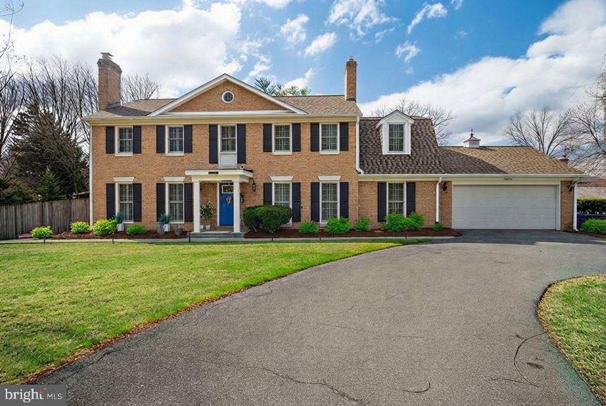 Arrive home to timeless elegance as you enter the grand circular driveway of this classic brick Colonial, beautifully positioned on a private .54-acre corner lot in the sought-after Flower Valley community. Surrounded by mature trees and lush landscaping, the property immediately feels like a peaceful retreat.

But the true showstopper awaits in the spectacular backyard oasis. Designed for unforgettable gatherings and everyday relaxation, the outdoor space features a stunning in-ground pool, expansive paver patios, gazebo, and beautifully landscaped entertaining areas, all framed by towering trees and a privacy fence that creates a resort-like atmosphere right at home.

Step inside to discover a bright, move-in-ready interior that blends classic charm with modern updates. The main level offers a traditional yet comfortable layout, beginning with a spacious living room with fireplace, perfect for relaxing evenings. The living room flows seamlessly into a separate formal dining room, ideal for hosting dinners and celebrations.

At the heart of the home is the light-filled kitchen, featuring white shaker cabinetry, granite countertops, and generous workspace. From here, large windows and doors invite natural light and provide direct access to the incredible backyard, making indoor-outdoor entertaining effortless.

Just off the kitchen is a cozy family room with exposed beams, creating the perfect everyday gathering space or TV lounge. Like the kitchen, this room also opens to the backyard, allowing the beautiful outdoor setting to become a natural extension of the home.

Upstairs, the home offers four generously sized bedrooms, including an expansive primary suite with a sitting room and custom walk-in closet, providing a comfortable and private retreat.

The fully finished lower level adds valuable living space with a large recreation room, wet bar, additional bedroom, and full bathroom, perfect for guests, entertaining, or creating a private suite.

With 5 bedrooms, 3.5 bathrooms, over 4,000 finished square feet, a 2-car garage, and one of the most inviting backyards in the area, this Flower Valley home offers the perfect combination of space, comfort, and exceptional outdoor living.