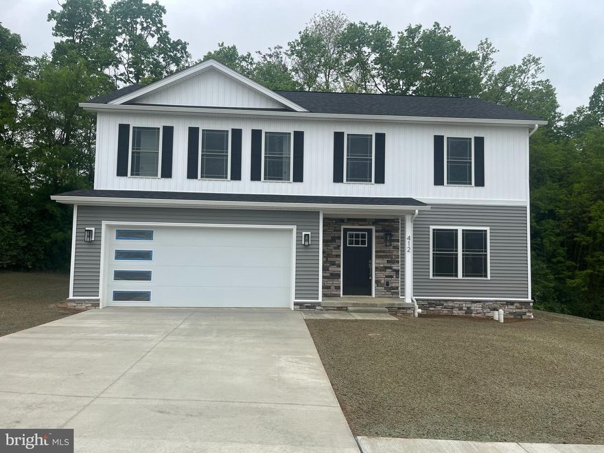 Looking for a 4 bedroom Brand New House with all the modern bells a whistles? Look no further than this 2010 square foot colonial being built in Skyhawk. It sits on a 1/2 acre lot! Finished in 30 days from 4/17/25. House has 4 bedrooms upstairs, and a room on the main level that could be used as an office, 2.5 bathrooms. Quartz countertops, LVP flooring through out, and concrete driveways! Call today for your personal tour. *****Photos are of a similar house, same floor plan, different colors*****