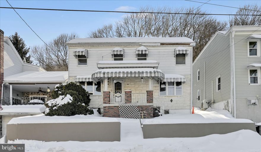 Cozy two bedroom, one bath single in quiet residential area.  Home has efficient coal heat, replacement window, updated paint and redone hardwood flooring.  The home sits on a large yard with a patio and storage shed.  Call for your tour today!!