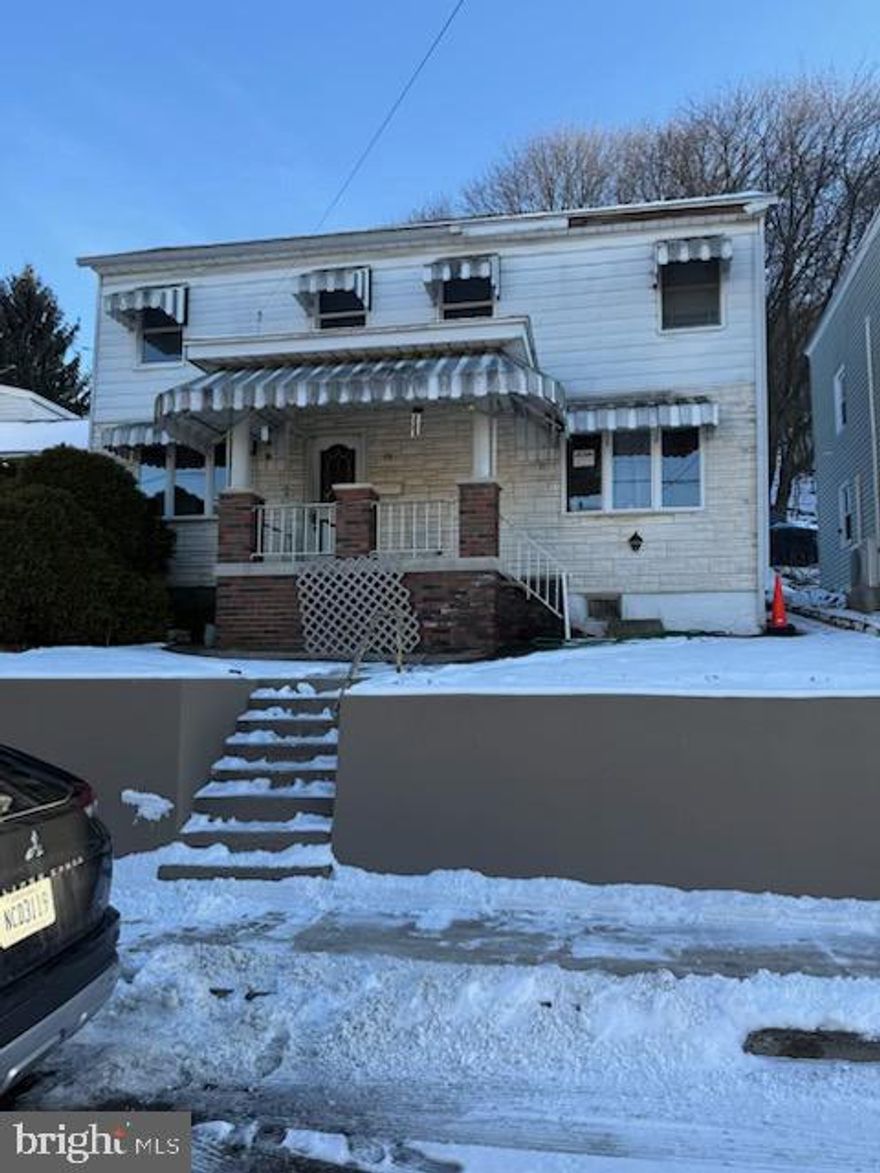 Cozy two bedroom, one bath single in quiet residential area.  Home has efficient coal heat, replacement window, updated paint and redone hardwood flooring.  The home sits on a large yard with a patio and storage shed.  Call for your tour today!!