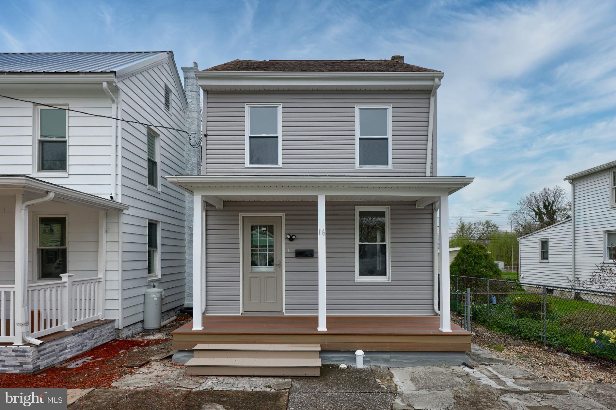 Step into comfort, style, and peace of mind with this beautifully renovated single-family home located on a quiet street in charming Middletown, PA. Everything has been thoughtfully updated from new walls and flooring to —new HVAC, plumbing, and water heater—so you can move in and start fresh with confidence in a thoughtfully updated home.
The main floor features a spacious open layout with new flooring, large windows, and natural light that fills every corner. Whether you’re hosting or relaxing, the flow between the living space and kitchen is ideal. The kitchen boasts classic wood cabinetry, granite-look countertops, brand new appliances, and a large custom island, creating a warm and functional space that’s ready for all your favorite meals.
The second and third floors have been renovated to the same high standard, offering plenty of space for bedrooms, office, or whatever fits your lifestyle. The updated full bathroom offers clean finishes and a bright, modern feel.
Outside, you’ll love the newly rebuilt front porch—a perfect spot to sip your morning coffee or wave hello to the neighbors. The home also offers a partially fenced backyard, a freshly paved sidewalk, and convenient on and off street parking.
Located just minutes from downtown Middletown, schools, shopping, and commuter routes, 16 Juniata is perfect for anyone looking for a move-in-ready home in a well-established neighborhood.