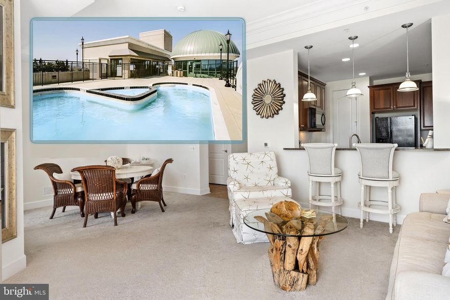 PRICE ADJUSTMENT! COSMOPOLIAN 2BR/2.5BA CONDO in the GRANDVIEW AT TOWNE CENTRE!  Condo complex rich in amenities incl. rooftop pool, lounges & bars, fitness center, premier mall shopping/dining, and 2 covered garage assigned parking spaces (EV hook-ups available).  Elegant hotel-style lobby with bank of elevators to your 5TH FLOOR UNIT with coveted OPEN AIR BALCONY offering PANORAMIC ANNAPOLIS VIEWS.  Open concept floor plan combining Living Room & Dining Room with cutout into high-end black/granite Biedermeier inspired Kitchen.  Double window Sunroom or possible Home Office.  2 Primary Bedroom Suites with double oversized windows, ensuite Tuscan tile spa Baths with dual vanities, & ample walk-in closets. Half/Guest Bath & Laundry Room.  Step outside to eclectic bistros & eateries, premier brand name shopping, & a buffet of renowned restaurants!  Mere minutes to downtown City Dock Harbor, the USNA, AA Medical Center, & bustling Bay boating/marinas.  Convenient to commuter RTs 50/97/2.  LIVE THE ANNAPOLITAN LIFE IN SUPREME COMFORT & STYLE!