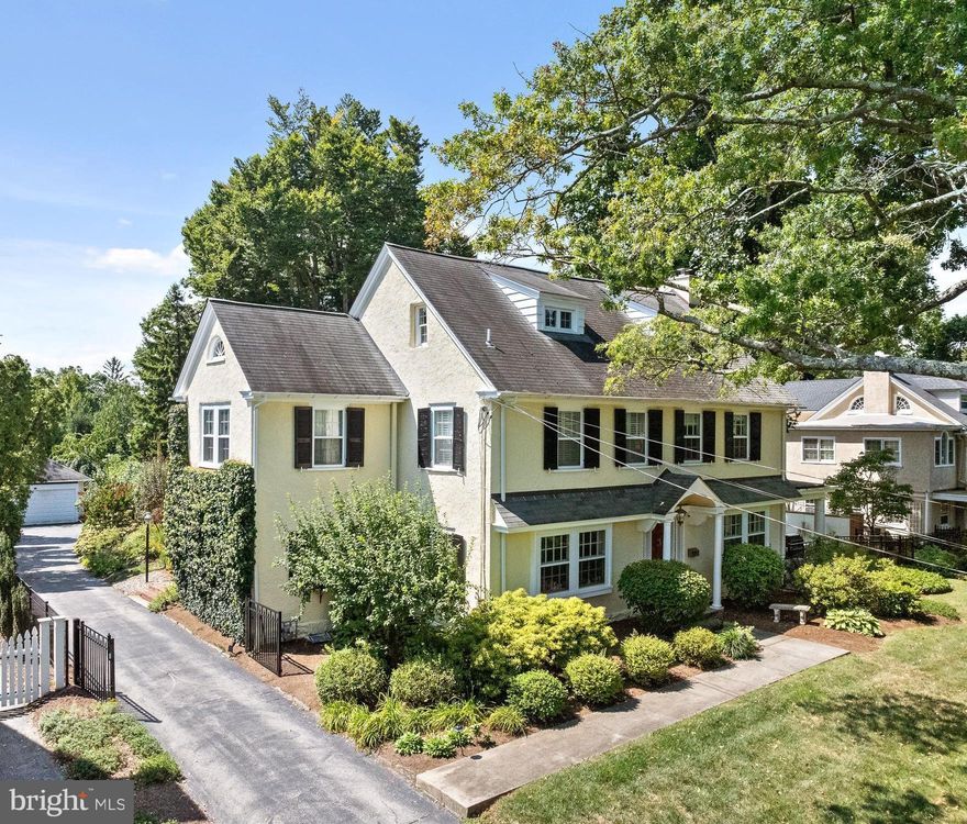 NEW PRICE  Don't miss this opportunity! Experience refined living at its finest in this remarkable home, where the charm of timeless architecture meets modern convenience, creating the ultimate dream home for families looking to plant roots in one of Wayne's most sought-after neighborhoods. This 5-bedroom, 3.5-bathroom Colonial masterpiece, in the award winning Radnor school district , sits on a serene .49-acre lot, offering the privacy of a gated sanctuary while keeping you steps away from  the Radnor trail , through your own private gate, perfect for outdoor family fun and daily walks, as well as Wayne’s vibrant town center and  train station 
Step inside and be greeted by the grand foyer, with original hardwood floors and soaring ceilings which sets the tone for a home that’s as stylish as it is inviting. The sun-drenched living room is a perfect blend of cozy and elegant, with oversized windows framing views of lush greenery and a white brick hearth with a convenient gas fireplace, perfect for family nights or hosting friends. Open the French doors to your own covered terrace, for morning coffees, al fresco dining with summer BBQs, or just relaxing under the stars.
The spacious formal dining room, adorned with chair rail, and  crown moldings, seamlessly flows into the kitchen where white cabinetry, gleaming carrera marble countertops, and stainless steel appliances create a bright, functional space with an additional staircase to the second  level and a convenient breakfast eating space
The second-floor primary suite is your personal escape, offering a spa-like bathroom with a freestanding soaking tub, dual vanities, and a custom walk-in closet. Two additional bedrooms and a beautifully renovated bath complete this level—perfect for a growing family. The third floor offers more flexibility with two extra bedrooms—ideal for a home office, playroom, or guest suite.
The  finished lower level offers space for a home gym, game room, or movie nights, along with a spacious separate laundry room and ample storage

Step outside and be surrounded by century-old trees and formal gardens, with a spacious yard fully fenced,  for the kids to run and play, a designated dog run, and direct access to the Radnor Trail through a private gate on the property for daily adventures. A detatched 2 car garage sits at the end of the driveway and has parking for 3 additional cars!
This home offers an unbeatable combination of elegance, space, and walkable convenience to top-rated schools, dining, shopping, and parks—everything young families and out-of-town buyers could wish for. 

Perfect location for access to all major commuter routes including Philadelphia airport, Center City Philly  Rtes 476, 76, PA turnpike and New York