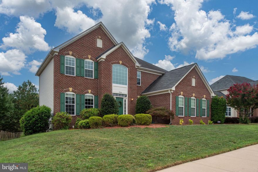 Welcome to this beautiful Estates at Lees Parke beauty yet traditional floor plan Colonial. 
Let’s start with the showstopper: the screened porch. Picture this—a stone-surrounded, wood-burning fireplace, your morning coffee, your evening unwind, and every cozy moment in between. The fenced backyard backs to woods, giving you the privacy and peaceful setting everyone is secretly (or not-so-secretly) hoping for.
Inside, this home brings the space. The bedrooms are all generously sized, and the oversized walk-in closet in the primary suite deserves its own round of applause. On the main level, you’ll find a gourmet kitchen that flows into a bright sunroom/breakfast room with access to that dreamy screened porch, as well as your massive family room with a gas fireplace for convenience and coziness. There’s also a formal dining room, a comfortable family room, and a main-level laundry/mudroom right off the two-car, side-load garage—because convenience should absolutely be part of your everyday routine.
The fully finished basement is ready for anything: movie nights in the custom built-in media room, game days in the large recreation room, a full bath for guests or weekend warriors, and walk-out access to the backyard.
Additional perks include crown molding, great storage, and a classic brick-front exterior that never goes out of style.
The Estates at Lees Parke offers fantastic amenities: a community center, fitness facility, outdoor pool, basketball and tennis courts, and miles of walking and jogging paths. And while you’re tucked away in a peaceful community, you’re still just minutes from I-95, commuter lots, shopping, dining, and everyday necessities.
If you’re looking for space, comfort, and style in a well-appointed community—this one checks all the boxes.