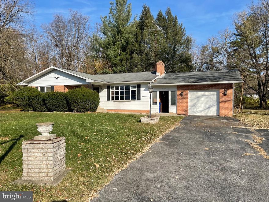 OFFER MUST BE SUBMITTED BY 7:00PM THURSDAY 1/4.   For sale, 3 BR 1 & 1/2 BA RANCHER in need of some remodeling in quiet well-established neighborhood.   The home comes with a one car garage and a traditional breezeway connecting to the kitchen.  There are Hardwood floors throughout most of the main level.  The living room has plenty of sunlight and includes a wood burning fireplace.  The basement is unfinished but has plenty of potential.  It includes a large fireplace and plumbing with a toilet and sink for a future bath. The home sits on one of the larger lots in the neighborhood and is situated to allow for the maximum amount of privacy.  There is a wooded 1/3 acre lot behind the property that can be added to the sale for an additional $25,000 (see picture of future easement righ of way).  Conventional loan or cash offers preferred but updates are underway and being  completed by Dec 29th (renovated full bath and installing a range) to help better facilitate  FHA and USDA buyers. Note:  the tax assessment lists the lot as .34 acres but the lot dimensions add up to .48 acres.