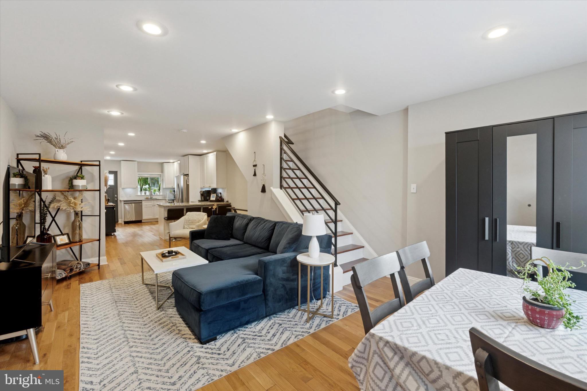 1% rate buy down for one year is being offered by Movement Mortgage. Reach out to the listing agent for more information. This beautifully maintained 3-bedroom, 2.5 bath row home in the vibrant neighborhood of Point Breeze at $340,000 is just what this market is missing. On the main floor, a generous living area flows into a bright, granite-topped kitchen with stainless steel appliances and recessed lighting, opening directly to a 19 ft deep backyard—perfect for entertaining or relaxing outdoors. Upstairs, enjoy a primary suite with its own full bath, alongside two additional well-sized bedrooms and another full bath—ideal for families or guests. Real hardwood floors illuminate the first and second floors, while a fully finished basement with a rear laundry room adds versatile living space and additional storage. With central A/C, forced-air heating, and modern utilities, this home balances efficiency and comfort. Located just south of Graduate Hospital, the home offers easy access to neighborhood favorites such as Insatiable, Madira Bar, Hannah K Cafe, Ringo Coffee & Donuts, Dock Street Brewery, Small Oven Pastry Shop, Sidecar, and Aldi.