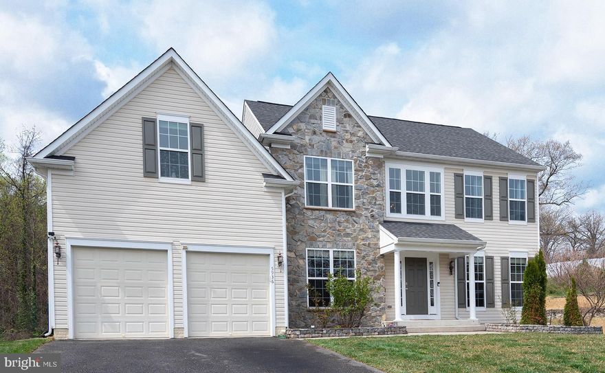 Stunning colonial boasting a captivating stone accent front facade and a charming covered front porch. As you step through the welcoming entrance, you will be greeted by gleaming wood floors that flow seamlessly throughout the main level.  The formal living and dining rooms provide the perfect spaces for entertaining, while a separate office offers a quiet retreat for work or study. A stylish powder room completes the main level for convenience. The heart of the home is the spacious kitchen, featuring a generous island and picturesque views of the serene woods beyond the backyard. Adjacent to the kitchen, the cozy family room is highlighted by a gas fireplace, creating a warm and inviting atmosphere. Step outside onto the deck, where you can relax and enjoy the peaceful surroundings of your expansive yard.Upstairs, you’ll find four generous bedrooms and two well-appointed bathrooms. The primary suite is a true escape, complete with a walk-in closet and a dedicated bath for your comfort and privacy. The lower level is a showstopper, fully finished with luxurious vinyl plank flooring. It offers a kitchenette, a gorgeous full bathroom, and an additional finished office space, perfect for guests or a home movie room. Ample storage ensures everything has its place.
Conveniently located near major commuting routes and parks, perfect for outdoor activities and leisurely strolls. Don’t miss the chance to make this beautiful colonial your forever home!