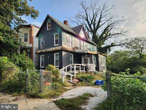 PRICE DROP !!!!!!!! PRICE REDUCED
Investment Opportunity!
This 3-Story Detached Home, located in the Irvington neighborhood of Baltimore City, is being sold AS IS, Where IS. Featuring hardwood floors throughout and classic architecture with a dollhouse-like exterior, this property is ready for your vision and renovation ideas.
Conveniently situated near Ascension St. Agnes Hospital, Wilkens Plaza Shopping Center, and the University of Maryland Baltimore County.
Note: All information provided in the MLS is deemed reliable but not guaranteed.
