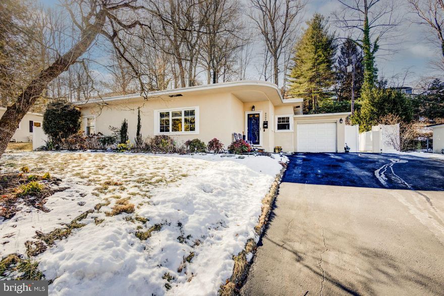 Nestled in the sought-after Whitemarsh Village neighborhood of Wyndmoor, this distinctive single-story contemporary home offers a unique blend of history, charm, and modern convenience. Built on the historic grounds of the former Whitemarsh Hall Estate, this residence sits just down the street from one of the estate’s original fountains—a reminder of the area’s storied past.

Inside, you'll find over 1,400 square feet of thoughtfully designed living space. The light-filled living room, anchored by a cozy fireplace, provides a welcoming setting for relaxation. Adjacent to the living area, the dining room is separated from the well-appointed kitchen by a breakfast bar, creating a seamless flow for everyday living and entertaining. The kitchen features stainless-steel appliances, granite countertops, a stylish tile backsplash, ceramic tile flooring, and gas cooking. A nearby laundry room with a stacked washer and dryer offers easy access to the powder room, a utility closet, and the back patio leading to the private backyard.

Beyond the main living areas, three spacious bedrooms share a classic three-piece tiled hall bath with a shower-over-tub layout. This home is in fantastic condition and ready for its next owner to move right in. Additional highlights include a one-car garage, a large driveway, and a prime location within the award-winning Springfield Township School District. Enjoy easy access to the shops and dining of Wyndmoor, Chestnut Hill, and Flourtown, as well as convenient routes to Route 309, the PA Turnpike, and Center City Philadelphia.

Don’t miss the opportunity to own this charming home in an unbeatable location!