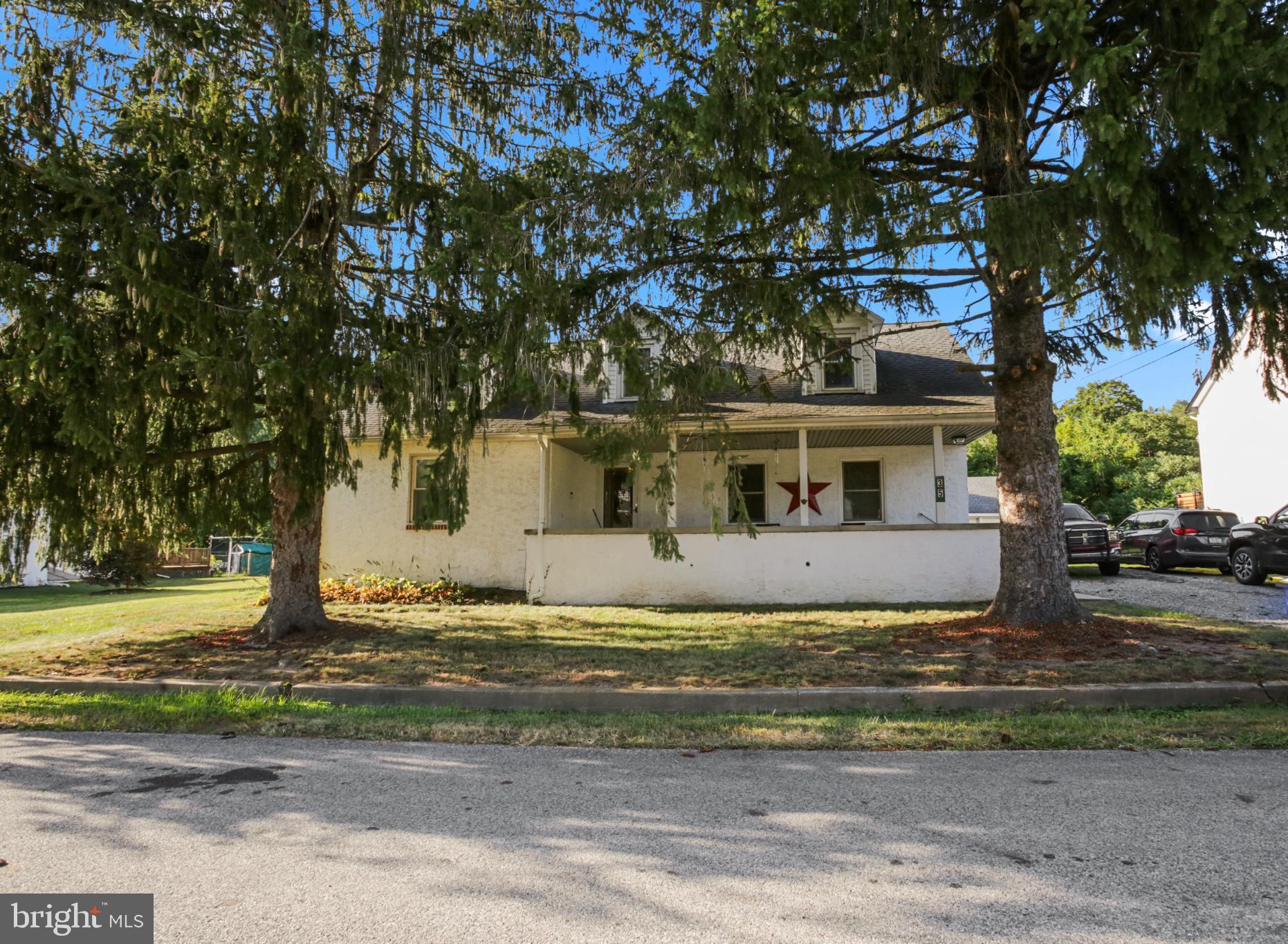 Offer deadline is Tuesday, 9/9 at 8:00 pm. Welcome to 35 Helen Street, an inviting and spacious cape cod home nestled in the desirable Sadsbury Township! Step inside to discover a bright foyer that leads into a cozy living room and a generous eat-in kitchen, perfect for gatherings. The kitchen boasts a pantry and seamlessly connects to a large deck with a ramp, offering stunning views of the expansive backyard—ideal for outdoor entertaining.
The main floor also features two well-appointed bedrooms and a full bathroom, providing comfort and convenience. Ascend to the second floor to find three additional bedrooms, all conveniently serviced by a second full bathroom.
The full basement is a treasure trove of storage space, equipped with a laundry area, a newer oil tank, and egress Bilco doors for easy access. Additional highlights of this exceptional property include central air conditioning, a detached 2½-car garage with 60 amp electrical service, and the convenience of public sewer. Don’t miss the opportunity to make this your dream home!