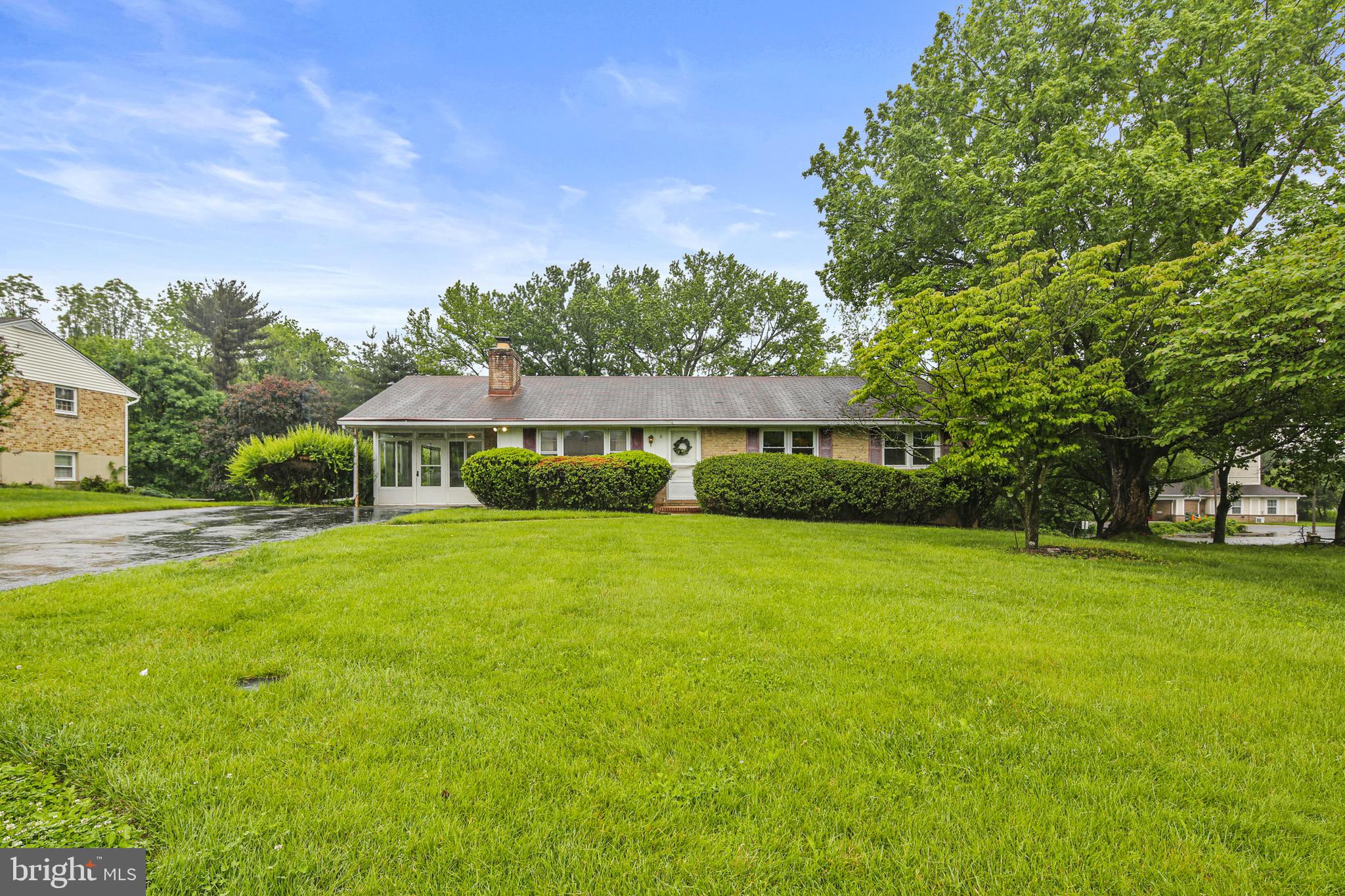 Welcome to this charming rancher situated on .46 acre lot just off Centennial Lane in Ellicott City. Large, inviting living room with tons of natural light includes wood burning fireplace flanked by built-in bookcases adding character and convenience. Spacious eat-in kitchen includes large table space with plenty of counter prep area, gas cook top, double wall oven, microwave & loads of cabinetry. Separate dining room awaits your next Sunday dinners or entertaining hosting holiday fun! The sunroom just off the kitchen is ready for an afternoon sipping tea or taking in a good book bringing the outdoors in. The home offers three cozy bedrooms, along with a full bath and a lower level hall bath, providing ample convenience for all. Hardwood floors under carpet from yester year need to be verified. Lower level includes walkout to a level yard with Spacious rec room and MAJOR hobby or craft area. Paint will be needed throughout. Lower level walls will need to be restored. NO HOA or Front Foot Fee...Location and proximity to so many amazing golf clubs, sports parks, state of the art Libraries, restaurants & shopping just minutes away! FT Meade, NSA, NASA, Baltimore 20 min., ANNAPOLIS & Washington DC 45 min. Home is being sold "AS IS"! BRING YOUR CREATIVE IDEAS AND TRANSFORM THIS HOME WITH LITTLE SWEAT EQUITY!!