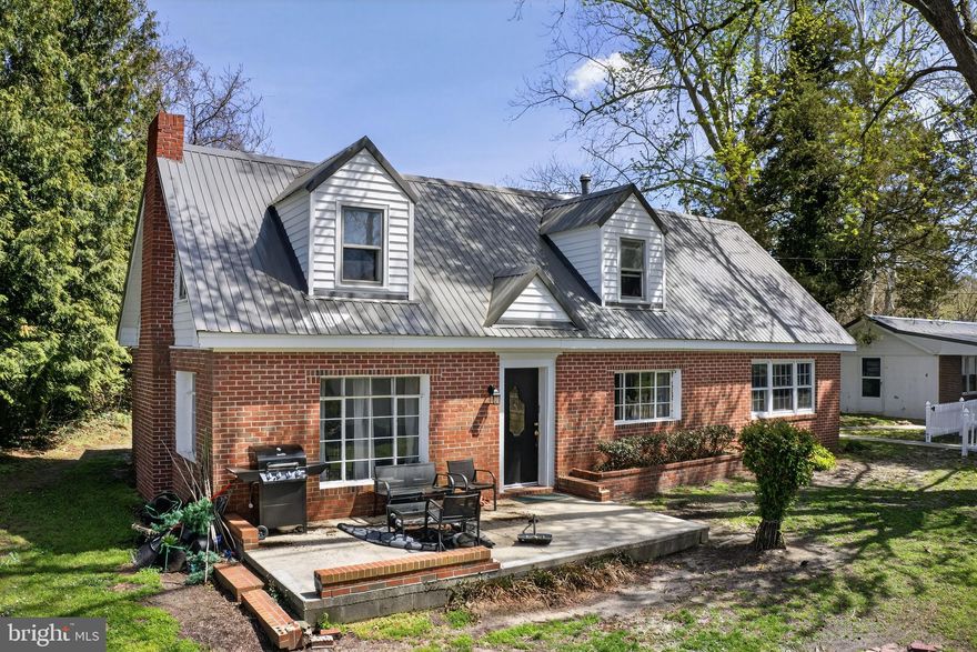 Welcome home to 28266 Riverside Drive, a rare offering nestled on the Wicomico River. It's not every day you find a spacious waterfront home with breathtaking views of the river AND a fully separate guest cottage/accessory dwelling unit! The possibilities await, and the only thing missing is your imagination and touch to make this home exactly what you need it to be!

Featuring 4 spacious bedrooms, 2 full bathrooms, and a timeless charm; this sturdy brick built cape cod(main house) greets you with a large concrete patio overlooking the river, before entering over 2000sqft of living space accented with knotty pine, exposed beams, brickwork, and hardwood floors. Both living structures are constructed on concrete slab, eliminating the possibilities of a problematic crawlspace! While these add to the eclectic eastern shore charm, thoughtful upgrades over recent years like long-lasting metal roofing, new heating pump, vinyl replacement windows, and a lead-free certification offer the peace of mind to help you focus on making the personal touches that will make this house HOME! 

The main house features a large bedroom on the entry level with it's own separate exterior entry, and a full bathroom on the entry level, while upstairs features 3 spacious bedrooms and a flex space in the hallway that could serve as a sitting/reading room, and an additional full bathroom to accompany the bedrooms upstairs. The living room features large bay windows, offering expansive views of the river right from the comfort indoors! 

The guest cottage features just over 400sqft of finished living space, complete with fully functioning kitchen, bedroom with full ensuite bathroom, and laundry. A covered patio adorns the front of the cottage, offering shade and outdoor flex space, helping you make the most of this hidden gem! 

Boasting ample space inside and out, this home looks across the river towards the historic Pemberton Park, offering peace of mind knowing that your waterfront views will always look as picturesque as now. This property also boasts approximately 25 feet of Wicomico River shoreline, recent survey available upon request. 

Located in the Fruitland Primary school district, this home is minutes from Fruitland and Downtown Salisbury, with shopping, restaurants, schools, healthcare, and recreation aplenty. Located under an hours drive to Maryland, Delaware, and Chincoteague Island VA Beaches, and just under 3 hours from major DC, Baltimore, and Philadelphia Metropolitan areas, don't miss this rare opportunity to create your own private waterfront paradise! Call to schedule a private tour today!