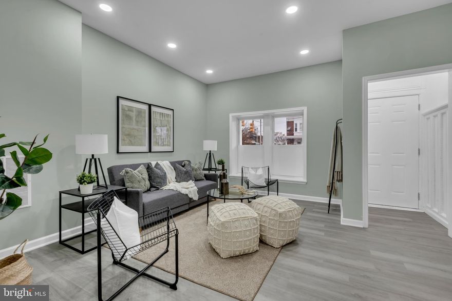 Welcome to 2543 Edmondson Avenue, an exquisitely renovated 5-bedroom, 4-bath Federal-style residence in the heart of Baltimore’s Rosemont community. Thoughtfully redesigned from top to bottom, this home offers the perfect blend of historic charm and modern luxury.

Step inside to discover a bright, open layout flooded with natural light and elevated by high-end finishes throughout. The stunning chef’s kitchen is the crown jewel of the home, featuring sleek quartz countertops, premium stainless steel appliances, custom cabinetry, and generous workspace ideal for both cooking and entertaining.

Each bedroom is impressively spacious, while the beautifully appointed bathrooms evoke a spa-like experience with contemporary fixtures and luxury tile selections. Every detail has been carefully curated to provide style, comfort, and lasting quality.

This remarkable property is move-in ready and poised to welcome its next owner.
An exceptional home where no expense has been spared — don’t delay. Schedule your private tour today.