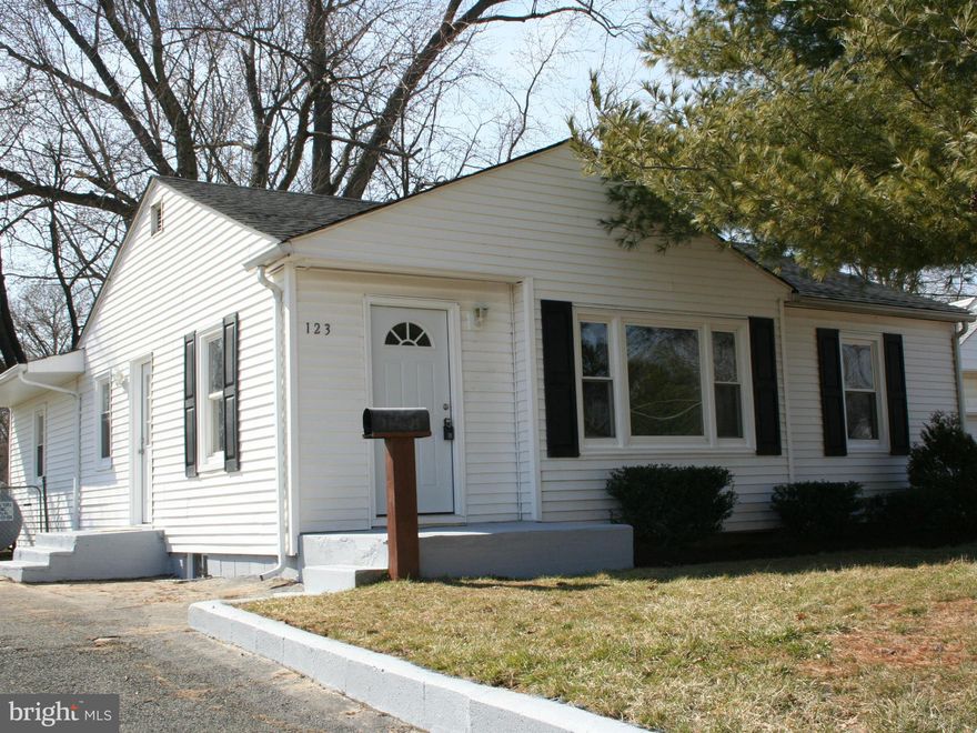 Stunning remodeled rancher with a new roof, kitchen; granite counter tops, maple cabinets, island and hardwood floors. All new stainless steel appliances.  Large master bedroom with a full master bathroom.  Large flat back yard and off street parking.  Full unfinished basement with new heat, a/c and water heater.  Spacious living room with new hardwood floors etc.  This home looks brand new!