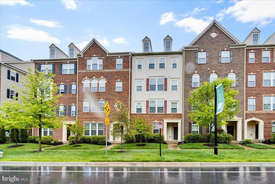 Picasso townhome-condominium in Greenbelt station pkwy! Many upgrades including maple kitchen cabinetry, granite countertops, stainless steel appliances, and hardwood kitchen. Home has been freshly painted and has many upgraded features such as surround speakers installed in living room.