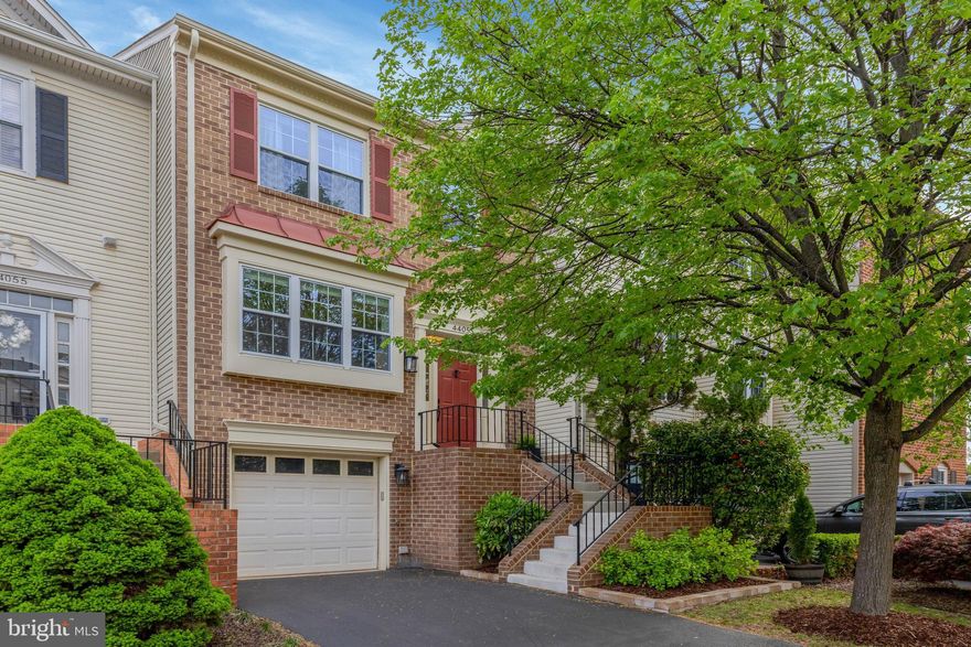 This beautifully updated brick-front townhouse in sought-after Ashburn Village offers stunning views of Pavilion Lake and direct access to the scenic walking and jogging trails that surround it. Enjoy natural light and serene water views from the sunlit breakfast room with southern exposure. The kitchen has been fully renovated with white shaker cabinets, sparkling white quartz countertops, a breakfast bar, stainless steel appliances, glass tile backsplash, updated sink and faucet, and modern pendant lighting. Durable wood-look porcelain tile floors run through the kitchen and powder room. All bathrooms have been stylishly refreshed with new vanities, stone countertops, contemporary faucets, and updated lighting, and the primary bath has been beautifully renovated to add a fresh touch of luxury. Enjoy access to Ashburn Village’s extensive amenities including a fitness center, indoor and outdoor pools, tennis and basketball courts, and more.  All of this just minutes from One Loudoun and the Metro, offering convenient access to the entire region.