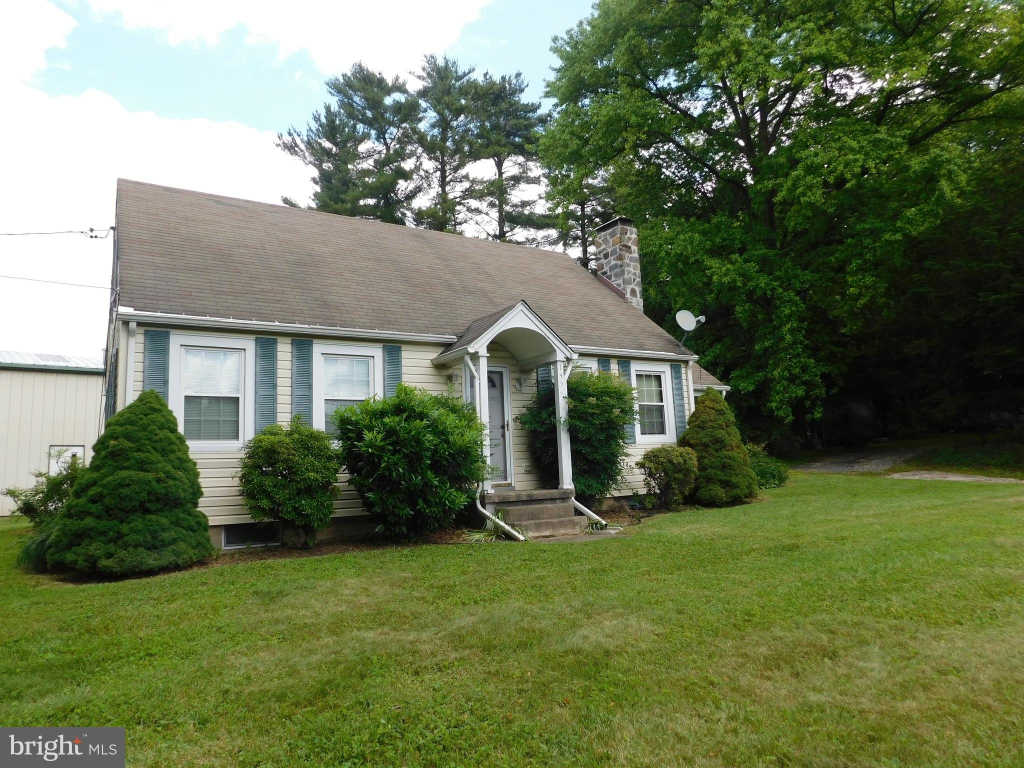 VB (Village Business) Property improved with 3 BR * 2 BA Cape Cod and 50' x 30' steel warehouse/office/shop building between Forest Hill and Jarrettsville! Hardwood flooring throughout the main level. Spacious second level bedroom suite with pine flooring, private full bath and walk-in closet. Both bathrooms are updated. The full basement is partially improved with a finished family room. Amenities include stone fireplace surround with slate hearth in the living room; flagstone covered side porch and fenced rear yard. Commercial building has concrete floor; 18' overhead door with auto opener; LP Gas HVAC system; 5 paved parking spaces. The property is permitted to be used for Construction Services and Outside Storage in accordance with the terms and conditions of the Special Exception Board of Appeals Case No. 4791. See MLS documents for detailed brochure, Seller disclosures, and Special Exception.