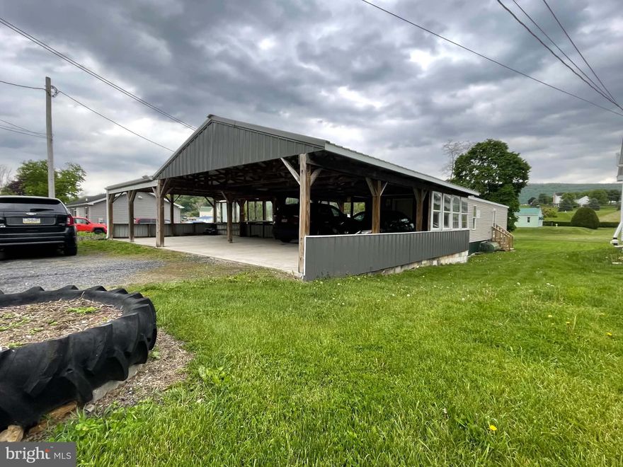 "Welcome to this nicely updated one-level home in a quiet residential neighborhood just minutes from Highway 322. The oversized carport easily fits over five vehicles, letting you pull right in and stay dry as you step inside. You'll love the freshly remodeled kitchen, bright living area, and fresh paint throughout. Enjoy the spacious deck off the side and a generous backyard perfect for evening fires. One-level living at its best!"