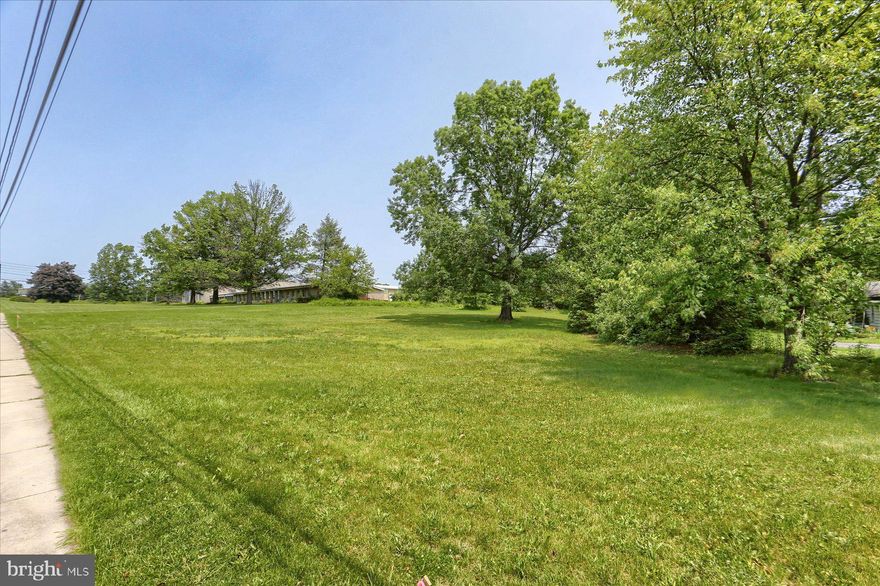 Don't miss this rare opportunity to own a level residential lot with prime visibility along a main road—ideal for a future home site, investment build, or expanded outdoor space. This parcel offers easy access to major highways, local shopping, and dining, combining convenience with flexibility. Whether you're looking to build new or extend the use of your existing property, this lot can be purchased in tandem with the home next door for a combined opportunity of added acreage, expanded yard, or future development. Public utilities are nearby, and the lot offers a straightforward build site with a desirable location for long-term value. Buy alone or pair with the adjacent fixer-upper ranch at 515 N Progress Ave—an excellent package deal for investors, builders, or anyone looking to create a unique compound.