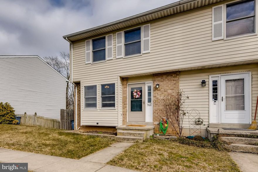 End of group town home in desirable Kimberly Village, Hampstead! Great space, updates and lots of features. Main level features half bathroom, pantry, kitchen with table space and granite countertops, bamboo flooring, dining room and family room with awesome shiplap wall and cozy fireplace! Upper level features master bedroom with his and her closets and a master bathroom. Additional full bathroom and 2 bedrooms finish out this level. Finished lower level with half bathroom, wood burning fireplace, walk-out, and utility room with washer/dryer and storage space. Huge deck with walk-down stairs to below patio, basement entrance, fenced yard and stairs leading to front of home with beautiful hydrangeas! Come see this home, it won't be around long!