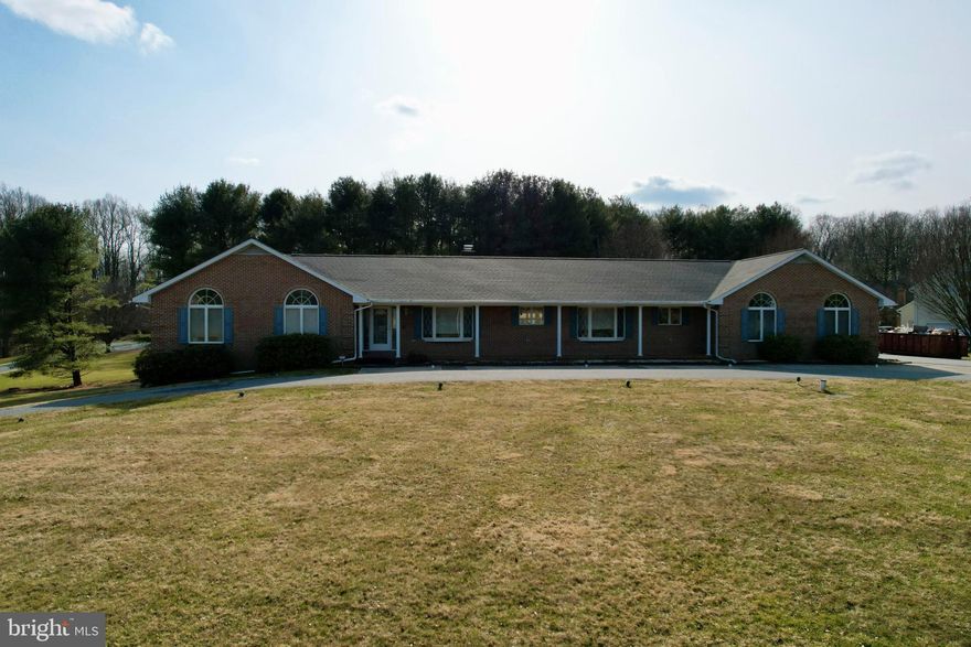 Welcome to Kingsville's FINEST!!  
 This  fabulous, sprawling ,   extremely well built and  cared for , 4 bedroom ,  3 .5  bath   brick Rancher will not disappoint! 
 Stately corner lot situated on  1.75  scenic  acres with a  convenient  circular driveway with parking leading straight  in front of the main entrance.   
Offering over 7800 sq ft of  bright,  open,  Ranch style living with so amenities. 
 The main level alone offers over 3800 sq ft of true living space. 
 Just to mention a few amenities:  beautiful crown moldings, chair rail,   sliding glass  pocket doors, some wood floors, skylights, vaulted ceilings in all bedrooms, double sided fireplace in family room and living with pellet stove insert, trendy glass block accents, lots of built ins, loads of closet space,  wide door frames for handicap accessibility.  The  primary suite  offers:  a sitting room / office area, 3 large walk in closets, a primary bath with 2  separate water closets, 2 person soaking tub with jets, separate shower stall,  2 separate vanities,  
The walk out  lower level offers:  Potential In - Law quarters with  an entire 2nd fully loaded  kitchen  with all appliances and lots of cabinets,  a 3rd  full bath,   huge family / rec room,   large eat in area,  game area,  separate  work out room and a huge storage area with 2 large crawls spaces.
 Awesome rear trex deck extending the entire length of the house,  great   private back yard. 
   THIS PROPERTY  IS BEING SOLD STRICLTY  AS  AN   " AS IS"    SALE  
  INTERIOR PHOTOS WILL BE UPLOADED  EARLY SATURDAY MORNING
PUBLIC OPEN HOUSE SUNDAY FEBRUARY 25TH FROM 1 TO 3PM