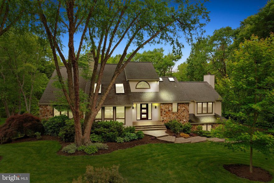 Welcome to 1007 Saber Rd, located in the highly desirable community of Radley Run. This stunning modern contemporary home with a first-floor primary suite is situated on nearly an acre of land on a tranquil cul-de-sac. Meticulously maintained and updated over the years, this property boasts exceptional curb appeal, featuring a beautiful front walkway with hardscaping and newer Hardie board siding, windows, and doors, all installed in 2016.

Upon entering, you’ll be impressed by the impeccable flooring throughout the home. The open foyer, with slate tile flooring, seamlessly blends with the site-finished hardwood floors that extend through the kitchen, dining room, and living room. The living room is filled with natural light, enhanced by two Velux skylights, and features a wood-burning fireplace and hardwood flooring.

The gourmet kitchen, the heart of the home, is bathed in natural light from a custom skylight bubble. It boasts stainless steel appliances and Azul Macaubas quartzite countertops. The kitchen opens to the family room, which features a vaulted ceiling, custom beams, and a second wood-burning fireplace. From the dining room, kitchen, and family room, you can access the expansive TimberTech deck with custom railing, perfect for entertaining or relaxing.

This level also includes an oversized laundry room and pantry with new slate flooring, as well as a primary bedroom retreat. The primary bedroom features custom blinds and a stunning ensuite bathroom with pocket doors, a jacuzzi tub, custom cabinetry with Brazilian quartzite, and an expansive tiled shower.

The upper level offers three oversized bedrooms and an updated bathroom with two Velux skylights. The walk-out basement features new luxury vinyl plank (LVP) flooring and an Anderson slider (to be installed), leading to a lower-level covered patio where you can relax and enjoy the peace and tranquility of the property.

The Radley community is renowned for its picturesque surroundings, prime location, and golf course, all just a short drive from the vibrant amenities and attractions of West Chester. With its harmonious blend of comfort, convenience, and elegance, 1007 Saber Rd offers the perfect fusion of modern luxury and serene living. Experience it all in this exceptional home.