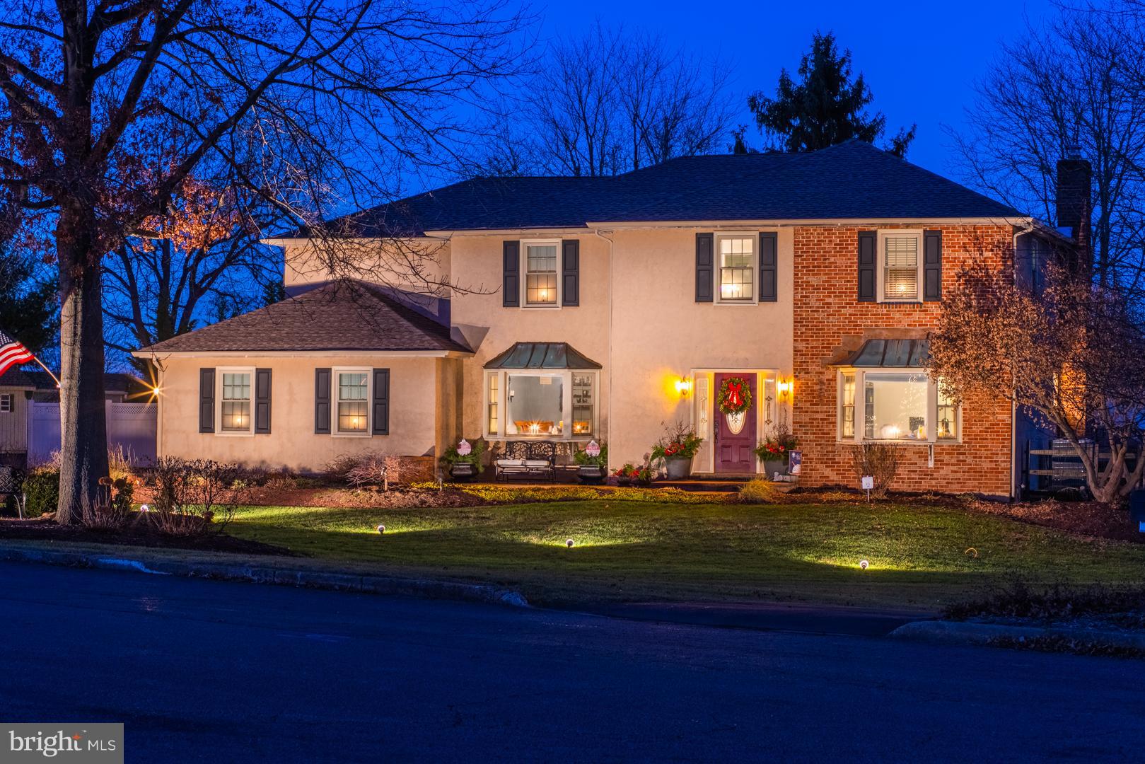 Better Than New! You can move right into this pridefully maintained five bedroom, 3.5 bath home with In-law quarters AND a 52' Dream Garage with workshop simply cannot be reproduced at this price! The open floor plan expands from the kitchen through to the family room with fireplace and dining area with direct access to the covered rear patio providing an ideal setting for entertaining family and friends. Flowing from the family room and hidden behind the backyard fence you will discover a professionally landscaped backyard utopia with over 100K in hardscape improvements including a heated in-ground pool, covered patio bar area just off the pool house with dressing room, gazebo, fishpond, and more. The Kitchen, which was designed and equipped to appeal to the culinary over-achiever with 2 ovens, 2 full sinks, 2 cooktop ranges, expansive counter space, is both functional and beautifully ordained with custom cabinetry and granite countertops and breakfast bar - a welcome feature for the conversational chef. Adjacent to the front foyer you will find a formal dining room with wainscoting and a formal living room (currently being utilized as an office). Proceed upstairs to find a tastefully decorated master bedroom suite with sitting room, large dual walk-in closets and master bath. Three additional bedrooms and a hallway bath round out the 2nd level. The finished basement has been designed to provide a separate living area with kitchenette 1-2 bedrooms and full bath. In addition to the 2 car attached garage, you'll love the huge garage with workshop and vehicle lift that can house up to 4 cars.  Set at the end of a private cul-de-sac with no through traffic, just minutes from major thoroughfares including Route 309 and 476. **Seller has also had a stucco inspection done already!