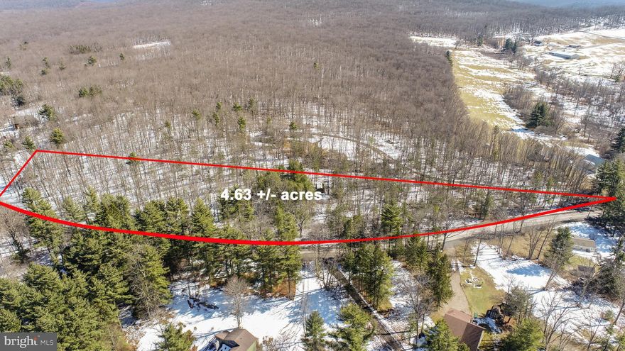4.63 acres with Lake Access at Deep Creek Lake! Located just across from Railcar on Green Glade Rd, this spacious parcel offers a unique combination of private wooded setting, just across the street from access to the lake. Well and septic already in place. No HOA. Worlds of potential for anyone looking to build a personal mountain lake retreat. Call today for details!