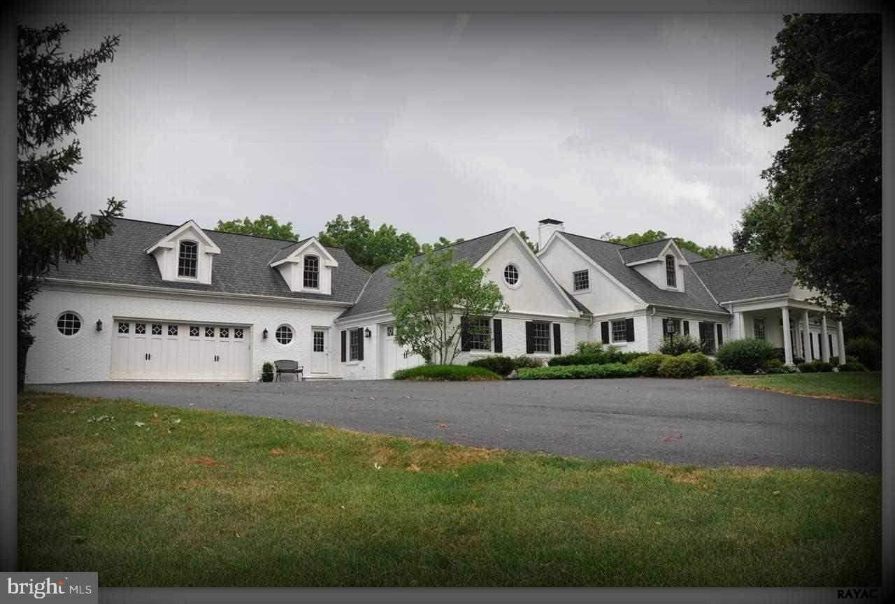 This Amazing home sits on a secluded 7.2 Acre lot featuring a 1 Acre pond & the best that luxury has to offer including oak wood floors, a dream kitchen w/ top of the line appliances & granite counters, master suite w/ stunning marble bath, 3 FP, 4 car garage,breath taking blue stone patio(s), an inviting pool w/ pool house, multiple zoned HVAC, & much more...