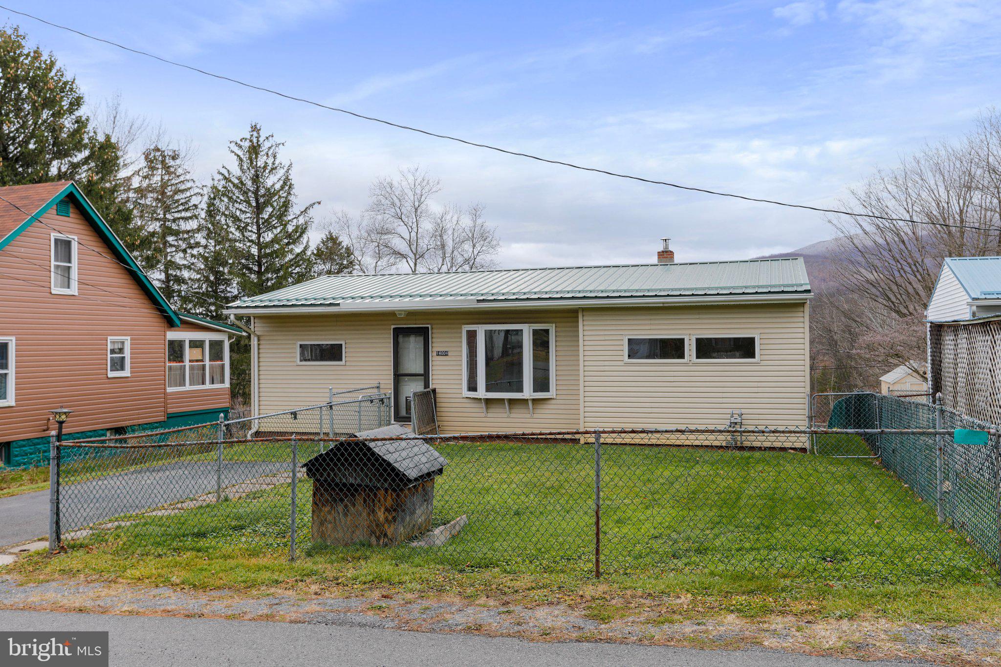 Enjoy main level living and no city taxes with this charming rancher located in Cresaptown! With private front and rear parking, hosting family and friends is a breeze! A fully fenced front yard allows the pets a place to roam! Once inside, you'll love the seamless flow from kitchen to dining area to living room! The hardwood floors in all three bedrooms are just waiting to be refinished to restore their original shine! The basement offers plenty of space in a storage room and what could be used as an office and/or rec room! All of this located just minutes from Cumberland, Northrop Grumman, Allegany College of Maryland, and so much more! Come see it for yourself today!
