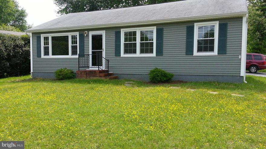 Charming & renovated home in walkable, waterfront town Updates include all windows, siding, gutters plus new trim & doors.Kitchen updates include cabinets,counters,ceramic tile floor. Baths have been redone. Hardwood floors refinished & lovely! Walk to Chesapeake Bay, library,marinas,restaurants, private town beach.Use your covered patio/carport to grill or enjoy the outdoors Welcome Home!.