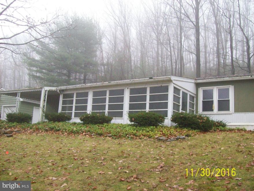 Very nice 2 bed, 2 bath manufactured home on a permanent foundation so financing is available. Situated on 5.17 mostly wooded acres in the Boyertown School District. The home features nice sized bedrooms, an updated kitchen with new appliances, a large living room and a separate laundry/storage room. There is a brand new roof on the house on the covered front patio and on the detached two car garage. The septic system has had a full inspection and is in terrific condition and a new UV light has been installed for the well. The taxes on this property are very low and the location is ideal. This property is part of the Freddie Mac First Look period for owner occupied and non-profits only until Dec 20, 2016. Purchaser responsible for any and all municipal requirements with Earl Township, purchaser to pat both sides of the transfer tax, no letters of intent, all funds must be certified including down money with no exceptions. Bank owned/REO property.