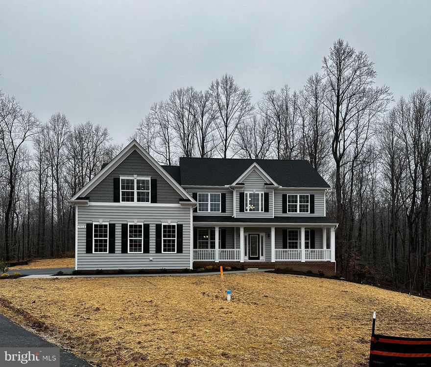 QBHI's A1 Hampton with a 3 car garage, morning room, 2' side extension and so many upgrades!  Vinyl plank throughout the main level, upgraded appliances, recessed lighting, large recreation room in the basement, plus a study and full bath. Upper level has 4 bedrooms, owners suite has tray ceiling, HUGE walk in closet, big full bath with deluxe shower, separate vanities and pedestal tub.  Call to build your QBHI home today.