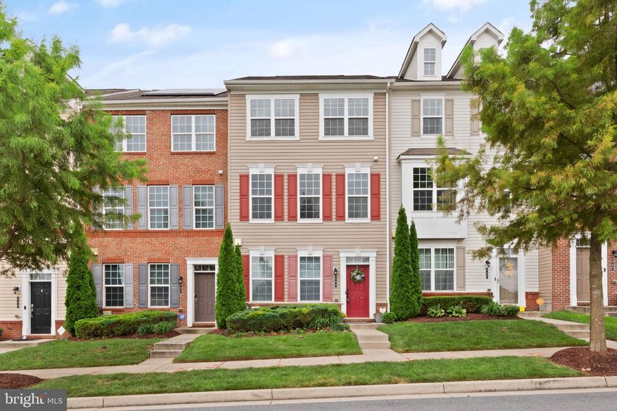 Don’t miss your chance to own one of only 12 lake-facing townhomes in the highly sought-after Residences at Quarry Place, offering stunning views of the tranquil 31-acre lake. Perfectly positioned on a prime lakefront lot, this meticulously maintained home features two spacious bedrooms, two full bathrooms, and two half bathrooms, with the option to convert the lower level into a third bedroom to suit your needs. Step inside to a bright and open main level where the gourmet kitchen impresses with granite countertops, 36-inch cabinetry, a pantry, a large island with a double sink, and stainless steel appliances, including a gas stove and a 3-year-old refrigerator. The space also features heavy-duty, high-end luxury vinyl plank flooring. The seamless kitchen-living room combination is ideal for entertaining and enjoying unobstructed lake views from every room facing the front. A maintenance-free deck with an electric retractable awning extends your living space outdoors, perfect for relaxing evenings. The upper level features two generous primary suites, each complete with a walk-in closet and a private full bath featuring granite vanities and tile floors. A convenient upper-level laundry area and ceiling fans throughout enhance everyday comfort. The versatile lower level features a half bath and provides access to the attached two-car garage, equipped with an automatic opener. The lower level can be ideal for a den, a home gym, or easily converted into an additional bedroom, and gain instant equity!  Located in a pet-friendly community, Quarry Place offers walking and jogging paths, a dog park, open green space, and a lakeside pavilion. The HOA handles lawn care, allowing you to spend more time enjoying the view. Conveniently located close to major commuter routes, shopping, dining, and entertainment, this home offers the perfect blend of natural beauty and modern convenience. Take advantage of this rarely available lakefront townhome. Schedule your private tour today!