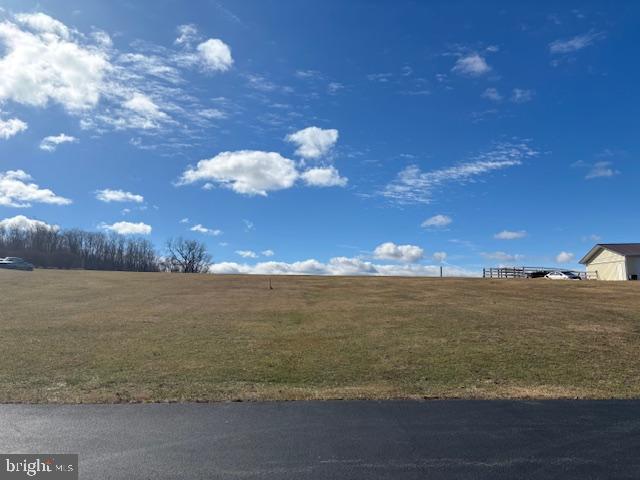 READY TO BUILD-STANDARD PERC & 15 gpm WELL. SEE ASSOCIATED DOCS FOR MORE INFORMATION.
THIS 1.91 ACRE LOT IS TUCKED AWAY ON A PRIVATE DRIVE IN A SMALL SUBDIVISION OF ESTABLISHED HIGH-END HOMES. THE STUNNING NATURAL BEAUTY IS THE PERFECT SETTING W/ BREATHTAKING PANORAMIC VIEWS OF ROLLING FARMLAND & BIG BLUE SKIES FOR MILES!!!!
SELLERS ARE REQUESTING THAT YOU DO NOT DRIVE ONTO THE PROPERTY TO VIEW. PLEASE PARK IN PARKING AREA ALONG THE PAVED ROAD.
WELL ON PROPERTY OF 15 GPM, W/ELECTRIC, & COMCAST CABLE ALREADY ON SITE.
NO HOA! BRING YOUR OWN BUILDER OR WE CAN RECOMMEND LOCAL BUILDERS.
THIS LOT IS READY FOR YOU TO BUILD YOUR DREAM HOME!!!
TAKE A LOOK BEFORE THIS BEAUTY IS GONE!!!