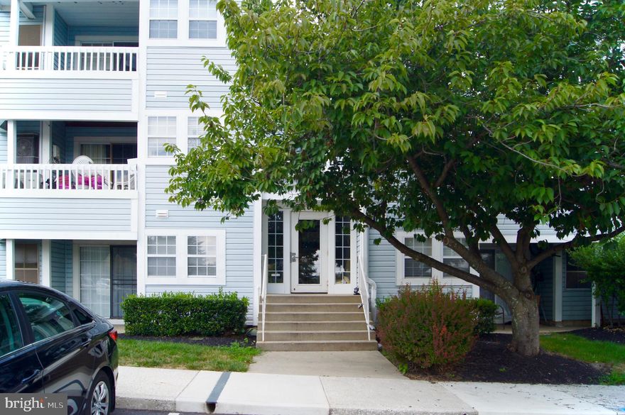 Move in ready! This 2 bedroom 2 full bath ground level condo is available for immedeite occupancy and located in a secured building right across from the community pool! Bright with lots of light, updated kitchen and bathrooms this first floor condo is located close to shopping, dining and major commuter routes. Washer and dryer in unit! Pets ok on a case by case basis.