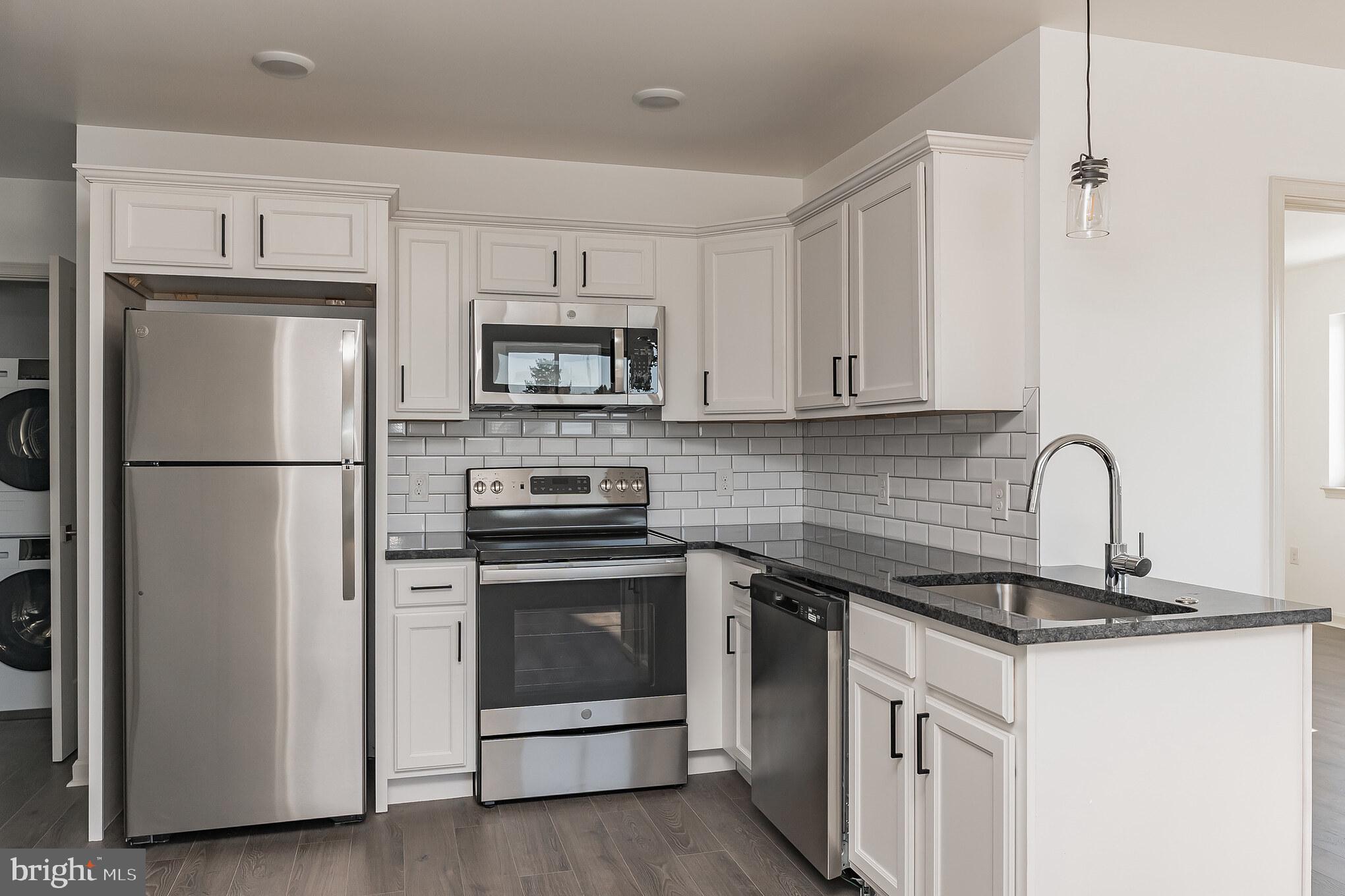 Available July 1st! Beautiful 2-BR/2-BA in a brand new construction apartment community. Located along Roxborough's vibrant Ridge Avenue corridor, convenient to shopping, dining, transit, and more! Your new home includes easy-to-clean vinyl wood plank flooring, custom granite countertops, and large windows that let in tons of natural light. Stacked washer & dryer in the apartment with dishwasher & garbage disposal make chores a breeze! Stay comfortable year-round with individually controlled PTAC Climate Control in each room. All residents at Lilac Pointe can access the green roof deck, resident lounge, and fitness center for no additional charge. Plus, we are pet friendly with NO FEES! Apply today- this home will not last long!