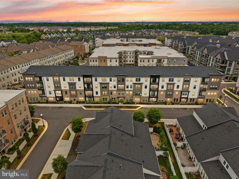 Photo of 23640 Bolton Crescent Terrace #403, ASHBURN, VA 20148 (MLS # VALO2125616)