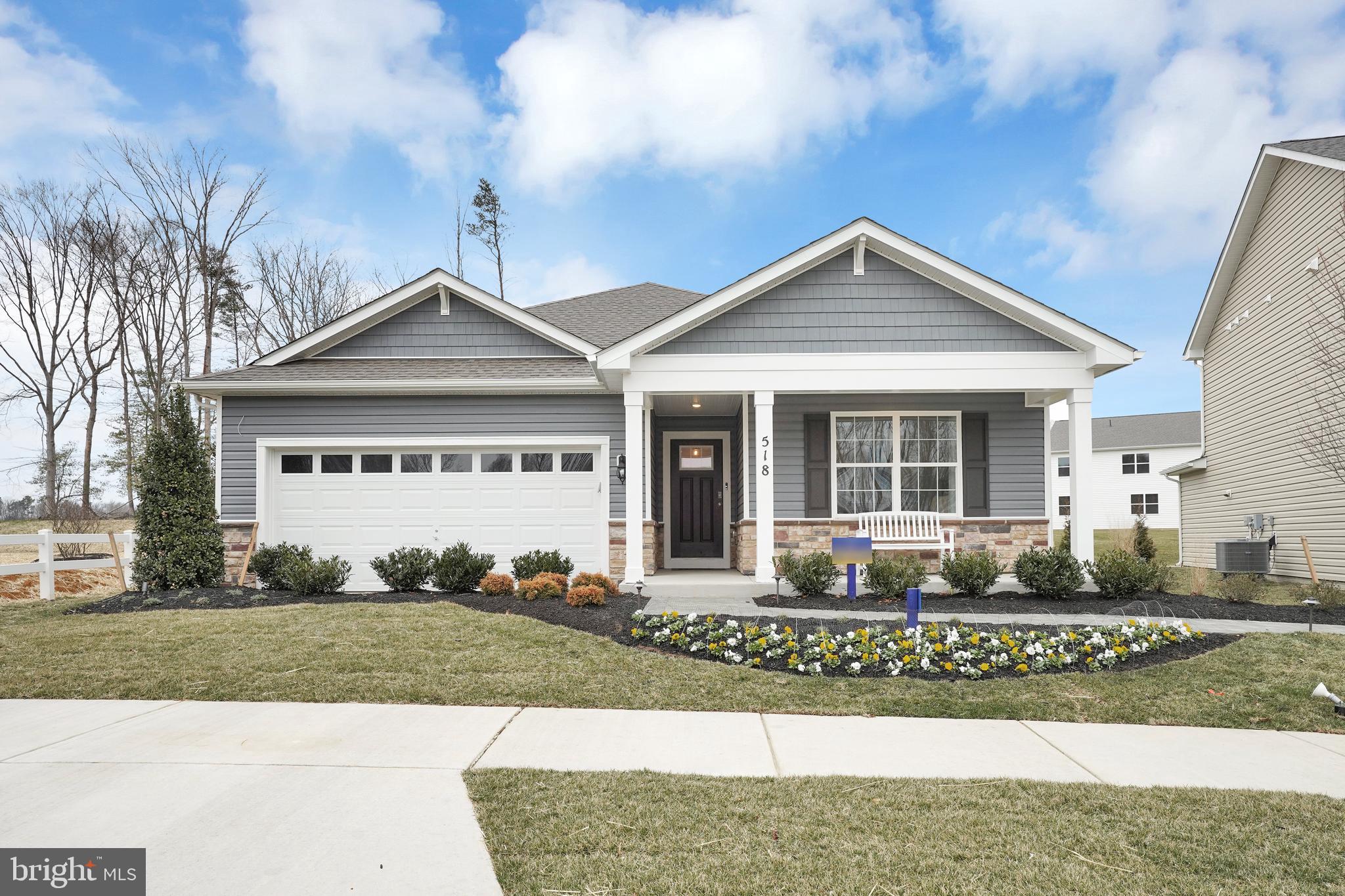 The Neuville plan features approximately 1,698 square feet, with 4 bedrooms, 2 bathrooms and an open concept layout. This design includes a spacious kitchen and gathering room, perfect for the multi-tasker. At the heart of the kitchen is a grand island where you can enjoy preparing meals while entertaining family and friends. Find comfort and relaxation in your secluded owner’s suite, featuring a walk-in closet and dual vanities. Quality materials and workmanship throughout, with superior attention to detail, plus a one-year builders’ warranty. Your new home also includes our smart home technology package! Compare our finishes that include granite countertops, 42” cabinets, tile, luxury vinyl plank, 2 x 6 construction, and stainless steel appliances to the competition. We are located approximately 20 miles south of Washington DC, 44 miles north of King George, and 86 miles north of Richmond. Beautiful woodlands surround our homes and give the community the feel of a delightful country setting. Pinegrove is within 50 miles of three major airports and a multitude of other outdoor recreation and parks. D. R. Horton keeps you close to the people and places you value most. Simplify your life with a dream home that features hands-free communication, remote keyless entry, and SkyBell video doorbell. It’s a home that adapts to your lifestyle, and with D. R. Horton's simple buying process and ten-year limited warranty, there's no reason to wait.