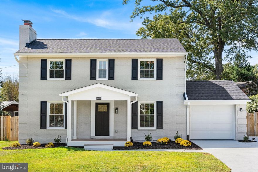 Welcome to this stunning custom renovation in Arlington! This 5-bedroom, 3.5-bath Colonial home boasts quality construction and meticulous attention to detail throughout its almost 2,600 sq. ft.

 

The new oak hardwood floors are running throughout the open floor main level. Living and dining space flow effortlessly, allowing for the utmost in entertaining flexibility.

 

As the heart of the home, the kitchen is a showstopper. It features custom Shaker style soft close cabinetry, stainless steel GE Café appliances, porcelain backsplash and premium quartz countertops. The well-designed space provides not only for great family dinners and celebration gatherings, but also for effortless everyday meal prep and after school homework.

 

The office flanks the living room and along with the stylish powder room, and the EV charging ready garage, complete the main level.

 

On the upper level, the primary bedroom suite features a custom walk-in closet, a ton of windows and a spa-like ensuite bathroom. The oversized shower, double vanity with premium quartz tops, and the back-lit mirror create a luxurious experience. The two additional bedrooms with hardwood floors and a full hallway bathroom complete the upper level.

 

The fully finished lower level offers a spacious rec room updated with recessed lighting, a wet bar area and luxury plank floors. The fifth bedroom along with a luxurious bathroom with a walk-in shower completes this level. The walk out access makes enjoying of the serene fully fenced in backyard a breeze. The rare garage along with the extra wide driveway affords ample parking space for residents and guests.

 

Sitting on a quiet street in Cherrydale neighborhood, this home is conveniently close to Metro, shopping, restaurants and parks. Move in ready and elegantly updated!