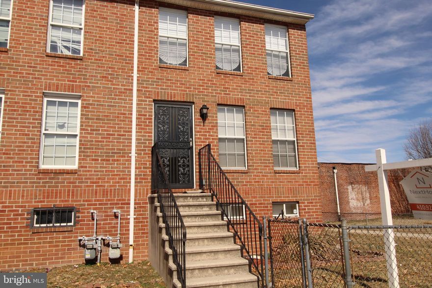 Welcome home to this beautifully refreshed end-of-group brick townhome in Baltimore’s Upton community! This 3-bedroom, 2-bathroom home boasts stainless-steel appliances, fresh paint, and new carpet throughout. Major updates include a new roof (4/2022) and front and back exterior entry doors replaced (10/2020). The spacious fenced yard wraps from front to back, providing the perfect outdoor retreat. Plus, a washer & dryer is included.   Conveniently located near downtown, public transit, and local amenities—schedule your tour today!  Housing Choice Vouchers welcome.