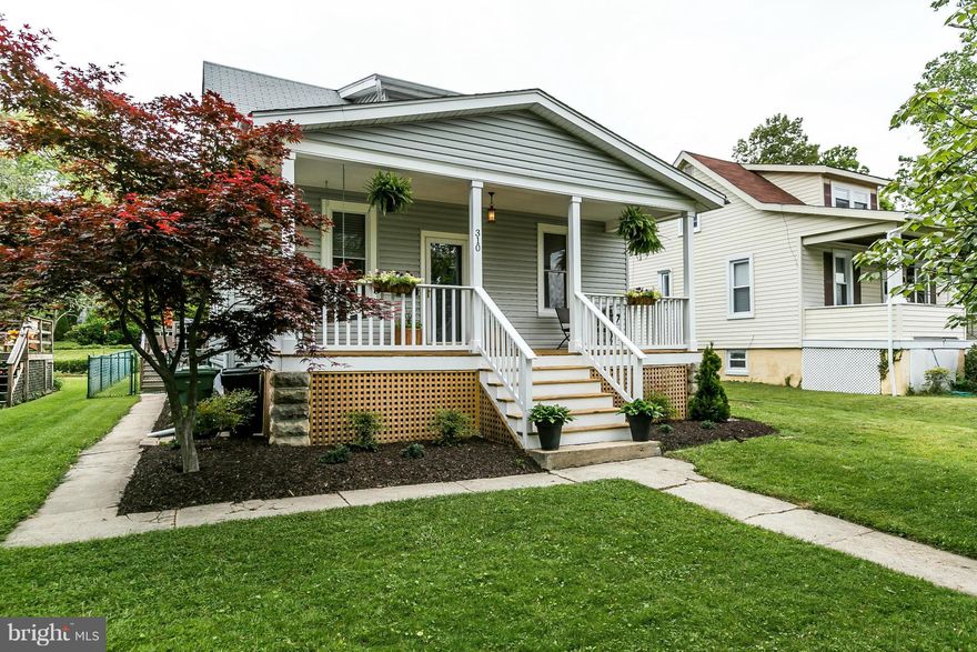 CHARMING 1920S BUNGALOW W/ GORGEOUS UPDATES THROUGHOUT. THIS GEM FEATURES 2 BR,2 F/BAs, GLEAMING HRDWD FLRS, NEW HVAC /2 -ZONES & WATER HEATER. KIT W/QUARTZ COUNTER-TOPS, SS APP, SHAKER CABs & MARBLE TILED BAs. GAS FIREPLACE IN LR W/ MARBLE SURROUND .SPACIOUS 2ND FL MSTR SUITE W/ FULL BATH & LARGE CLOSETS. PART. FIN. BSMNT W/ OFFICE, WORKSHOP & STORAGE. ENORMOUS REAR DECK PERFECT FOR ENTERTAINING!