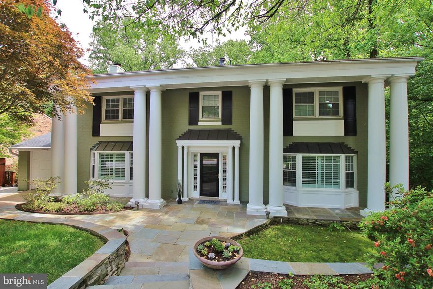 Imagine living on one of the BEST STREETS in North Arlington, enjoying a PARK-LIKE SETTING at the end of the CUL-DE-SAC. Just minutes away from DC and a beautiful drive along the GW Parkway, this stately home has been FULLY RENOVATED top-to-bottom to optimize all THREE FLOORS - so many thoughtful, FINE TOUCHES combine to make this an ideal place to call home - you MUST SEE this! The OPEN MAIN LEVEL is flanked by TWO FIREPLACES – one gas, one wood burning and is joined by a large GOURMET KITCHEN with breakfast bar, generous counter and cabinet space, stainless steel appliances, double ovens, gas cooktop and double sinks, each with a disposer. Three generous bedrooms upstairs with HARDWOOD FLOORS throughout, recessed lighting, ceiling fans, walk-in closet and crown molding. Fully renovated hall bathroom with private access to corner bedroom. An elegant master suite with COFFEE BAR, balcony, walk-in closet, dressing area and STUNNING EN-SUITE BATH - heated travertine marble flooring, rainfall shower, double sinks and large, bubbling MASSAGE TUB. Come see the TREEHOUSE VIEW from this SMARTLY DESIGNED master suite. Retire to the fully FINISHED BASEMENT featuring ceramic tile throughout, SECOND KITCHEN, powder room and a large fourth bedroom with en-suite bath and laundry that steps out onto the COVERED FLAGSTONE PATIO - makes a perfect au pair or IN-LAW SUITE. And, if that's not enough, this home has a BRAND-NEW ROOF, newer HVAC system, windows, upgraded and expanded electrical system, extensive landscaping, recessed lighting everywhere, custom plantation shutters and a large workshop. The only thing you need to do is MOVE IN and enjoy! All three levels WISELY PLANNED to take advantage of the TREE-LINED VIEW – five sliding glass doors and French doors on the rear of the home effectively capture the beauty outside - so many outdoors zones for  relaxing – EXPANSIVE DECK and covered patio, firepit area, covered grill area and that special master bedroom balcony to enjoy your morning coffee while listening to the birds sing. And this one is a walker, biker or jogger’s dream with the beautiful Donaldson Run Trail just outside your rear gate – part of Arlington County’s renowned bike path network. Occasionally the PERFECT OPPORTUNITY comes for you to enjoy the fruits of your labor – MOVE FAST to make this one yours!