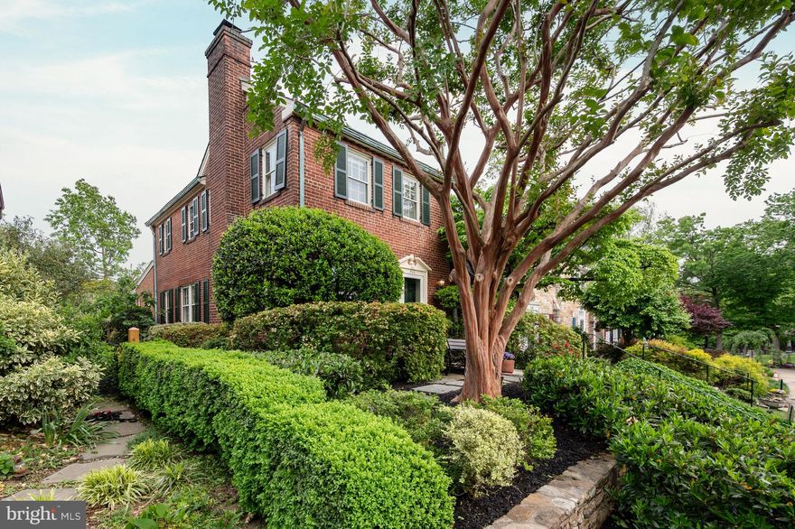 You'll love this end-unit row home in Yates Gardens, the desirable Southeast Old Town subdivision known for charming, well-built homes with loads of curb appeal. This brick home will not disappoint. Situated on a picturesque, dead-end block with two service roads — and yes, private parking for residents — you'll be moving to a block that one resident brags embodies the difference between living in a neighborhood and simply having a street address.  *** Enter the main level to a charming living room with a wood-burning fireplace. A broad opening leads to the dining room and on to a kitchen with white cabinets, Corian counters, and coordinated appliances (refrig 2024, dishwasher 2020). A pass-through connects to a wonderful family room addition, where light streams through a bay window and two skylights above, a second fireplace (gas) provides warmth and atmosphere, and the built-ins offer both open and closed shelving. A powder room is tucked in the corner for convenience. *** The upper level features three generous bedrooms and a retro-styled full bath. The original 1940s hardwood floors run throughout the main and upper levels, with tile in the kitchen and family room. *** There is a spacious rec room on the lower level, recently painted and updated with vinyl plank flooring. A laundry room, second full bath, utility room, and two triple storage closets (!) finish out the level. *** The generous lot is a nature lover's dream in the city. In front, seasonal tulips, azaleas, crepe myrtle, and multi-colored azaleas put on a show throughout the year. The path to the backyard is flanked by more perennials, irises, boxwoods, tulips, daffodils, roses and even a young magnolia and a prolific fig tree. In the backyard, you'll find a wisteria-covered pergola with a hanging swing and a shed for all your outdoor gear. Holly, oak leaf hydrangea, dogwood and lilacs provide a natural privacy screen on 3 sides and a beloved habitat for cardinals, robins and more. A handy back gate opens to the public alley for easy trash and recycling access and where you’ll find a concrete pad with anchor to secure – for example - a motorcycle. As you walk back up the steps to the back door, you’ll catch the glorious scent of honeysuckle. *** Located at the far southern end of Old Town, this home is quick on/off the beltway, easy walk to Jones Point Park or onto the bike path toward Mt Vernon, about 1/3 mile walk to King St, and even has local restaurants within 2 blocks. What more could you want??