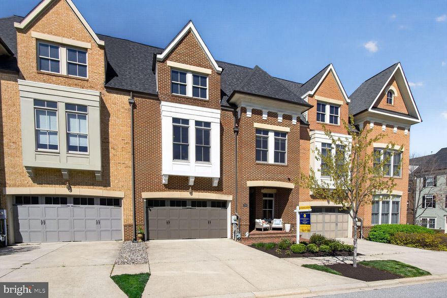 Discover an exquisite blend of luxury and comfort in this stunning 4-bedroom, 3.5-bathroom townhouse nestled in the prestigious Maple Lawn community. Built in 2010, this home boasts an impressive 3,328 sq. ft. of meticulously designed living space, featuring elegant crown moldings, hardwood floors, and a gourmet kitchen equipped with stainless steel appliances, a double oven, and a spacious island perfect for culinary enthusiasts. Relax in the inviting family room with a cozy gas fireplace or unwind in the opulent primary suite, complete with a soaking tub and walk-in shower. Step outside to enjoy the community's luxurious amenities, including a sparkling pool, fitness center, and tennis courts, all set against a backdrop of serene, tree-lined views. With a premium lot backing to a lovely pond, this home offers an exclusive lifestyle that seamlessly blends elegance with everyday living. Experience the pinnacle of refined living today!